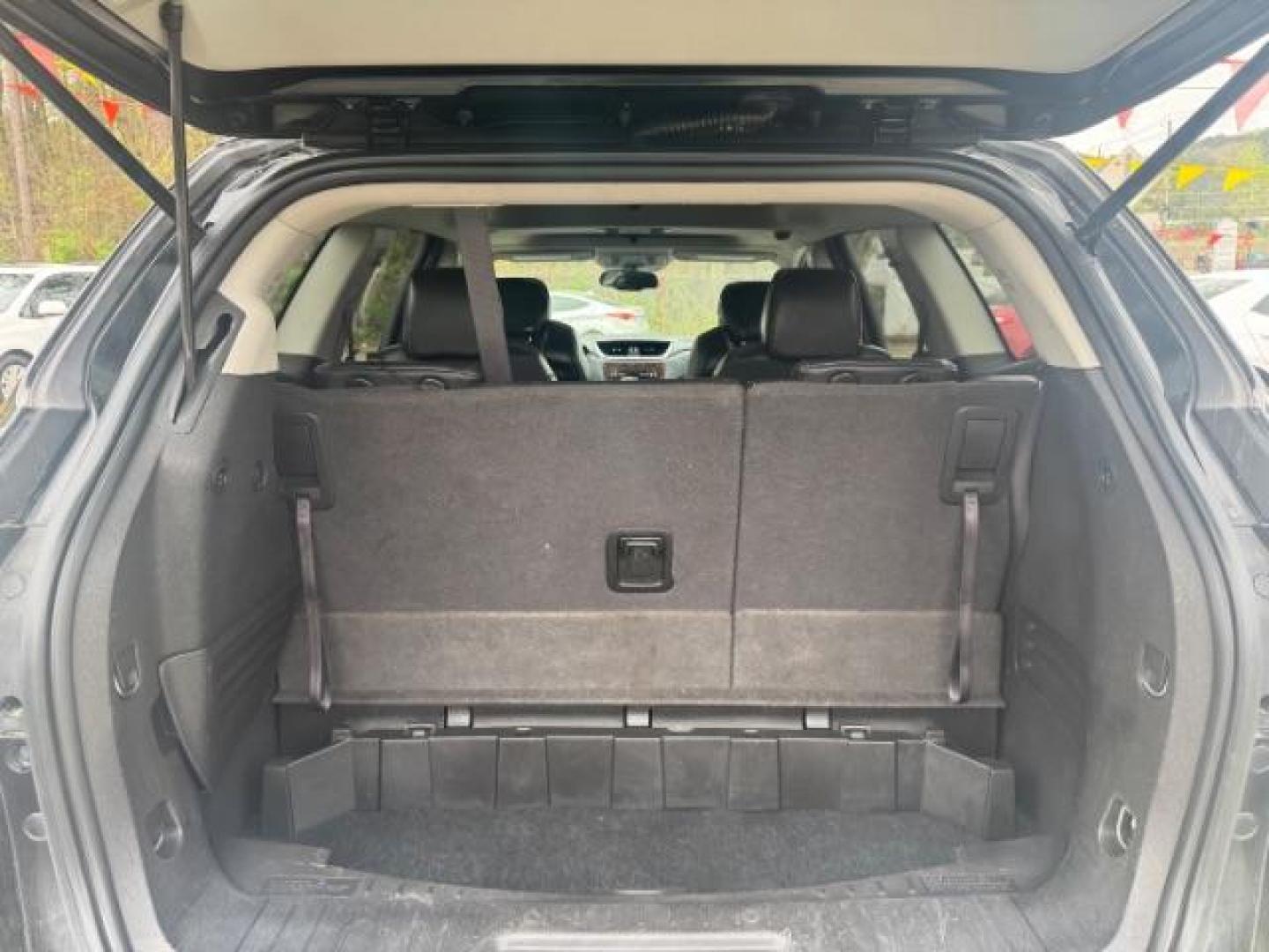 2013 BLACK Chevrolet Traverse LTZ FWD (1GNKRLKD1DJ) with an 3.6L V6 DOHC 24V engine, 6-Speed Automatic transmission, located at 1806 Veterans Memorial Hwy SW, Austell, GA, 30168, (770) 944-9558, 33.817959, -84.606987 - Photo#17