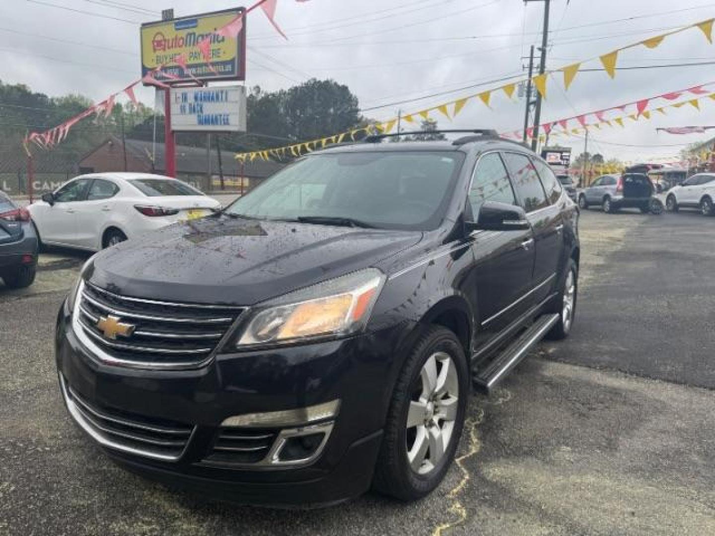 2013 BLACK Chevrolet Traverse LTZ FWD (1GNKRLKD1DJ) with an 3.6L V6 DOHC 24V engine, 6-Speed Automatic transmission, located at 1806 Veterans Memorial Hwy SW, Austell, GA, 30168, (770) 944-9558, 33.817959, -84.606987 - Photo#0