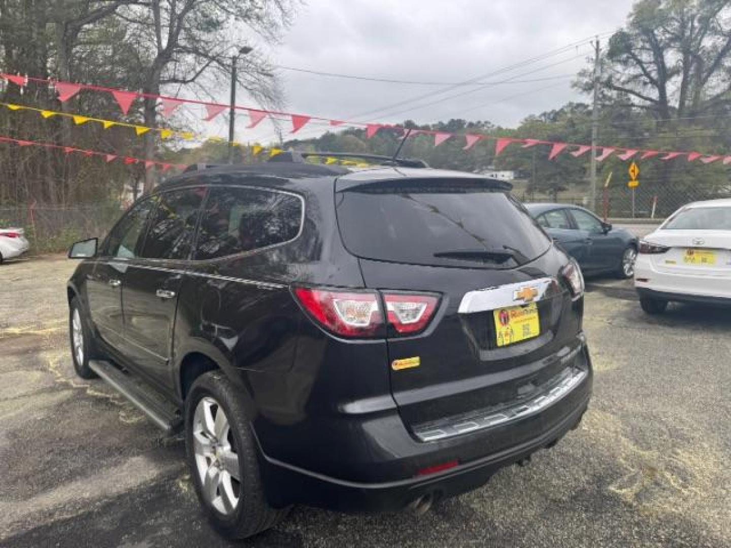 2013 BLACK Chevrolet Traverse LTZ FWD (1GNKRLKD1DJ) with an 3.6L V6 DOHC 24V engine, 6-Speed Automatic transmission, located at 1806 Veterans Memorial Hwy SW, Austell, GA, 30168, (770) 944-9558, 33.817959, -84.606987 - Photo#5