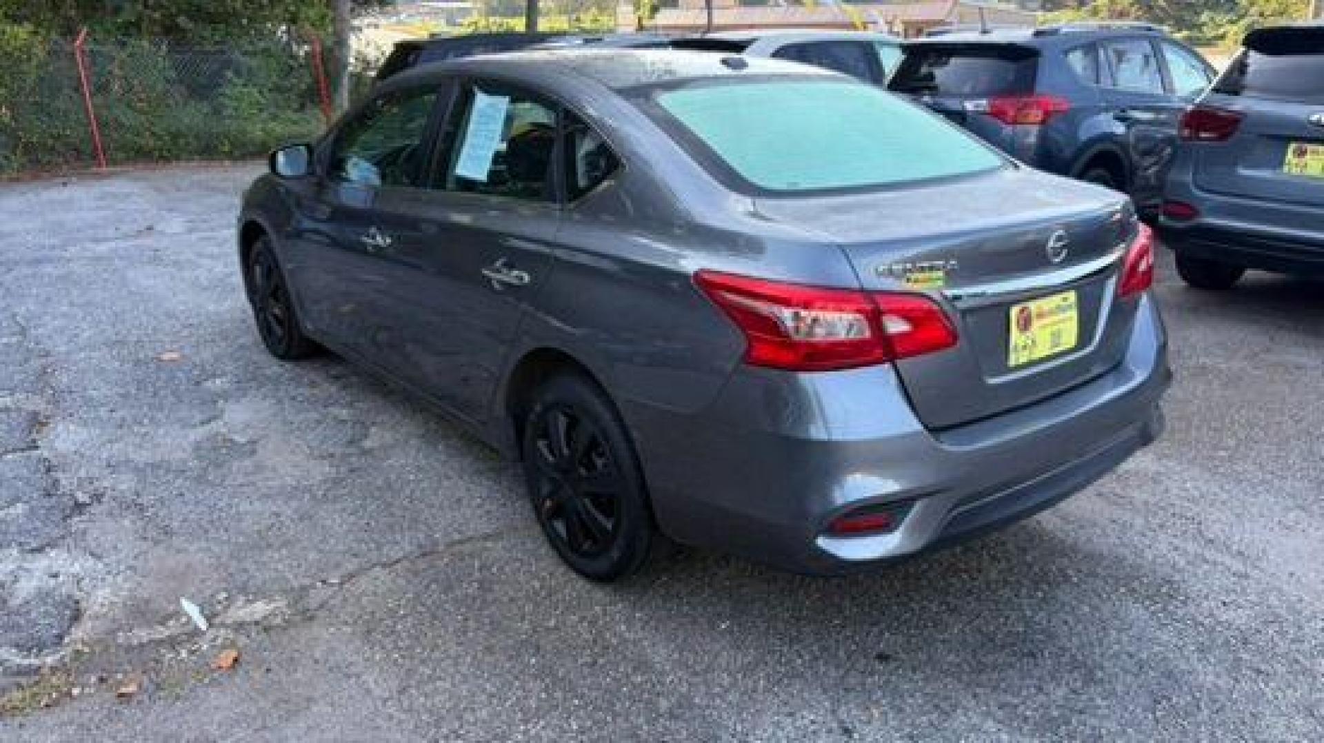 2017 Gray Nissan Sentra SV (3N1AB7AP1HL) with an 1.8L L4 SFI DOHC 16 engine, Continuously Variabl transmission, located at 1806 Veterans Memorial Hwy SW, Austell, GA, 30168, (770) 944-9558, 33.817959, -84.606987 - Photo#5