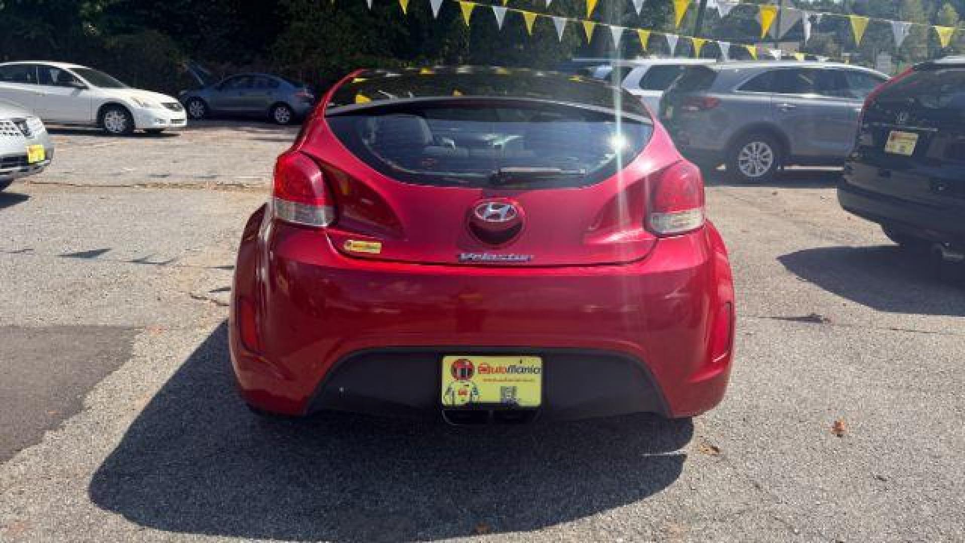2013 Red Hyundai Veloster Base (KMHTC6ADXDU) with an 1.6L L4 DOHC 16V engine, 6-Speed Automatic transmission, located at 1806 Veterans Memorial Hwy SW, Austell, GA, 30168, (770) 944-9558, 33.817959, -84.606987 - Photo#3