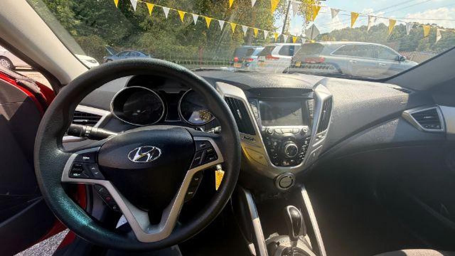 2013 Red Hyundai Veloster Base (KMHTC6ADXDU) with an 1.6L L4 DOHC 16V engine, 6-Speed Automatic transmission, located at 1806 Veterans Memorial Hwy SW, Austell, GA, 30168, (770) 944-9558, 33.817959, -84.606987 - Photo#5