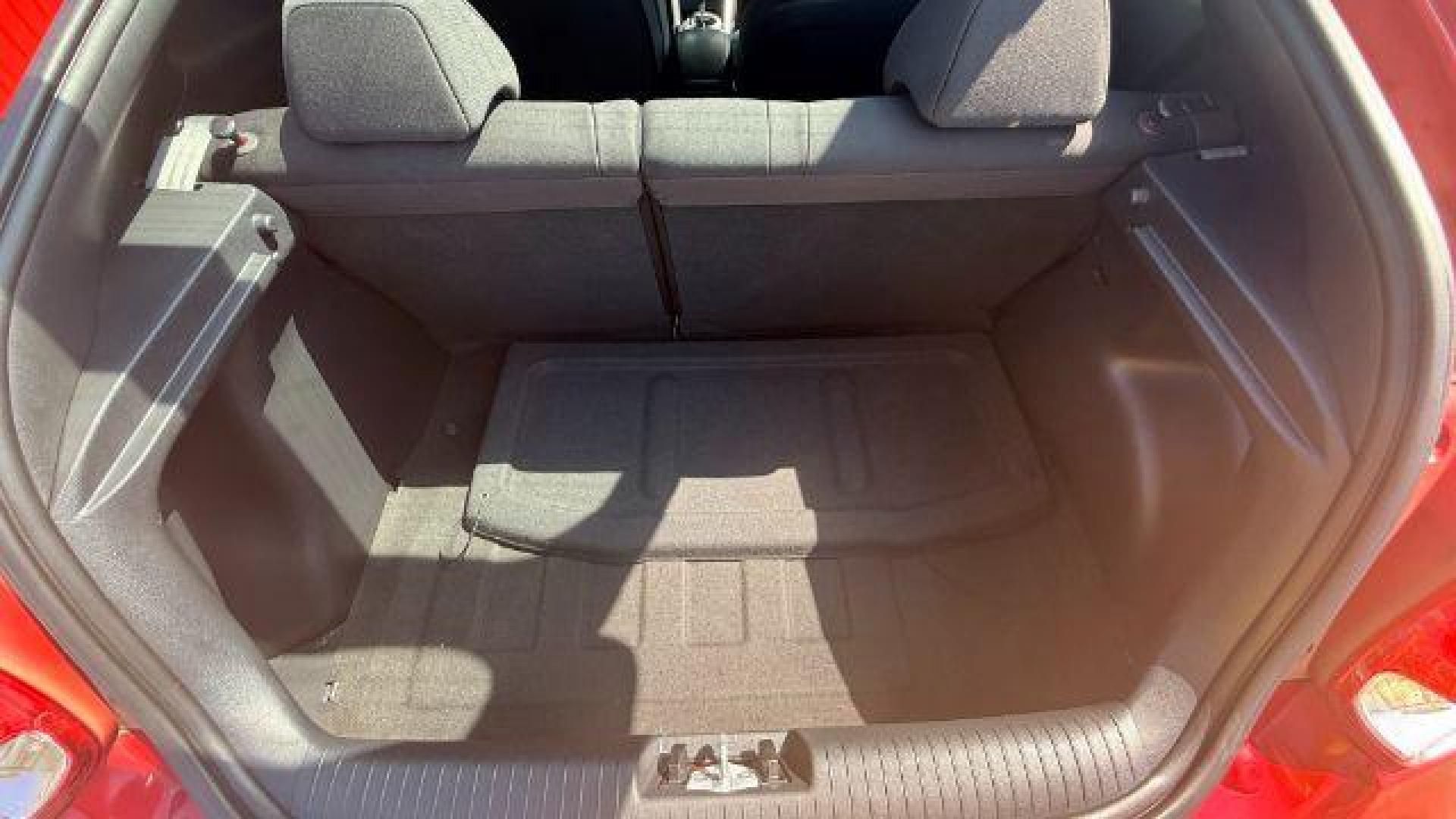 2013 Red Hyundai Veloster Base (KMHTC6ADXDU) with an 1.6L L4 DOHC 16V engine, 6-Speed Automatic transmission, located at 1806 Veterans Memorial Hwy SW, Austell, GA, 30168, (770) 944-9558, 33.817959, -84.606987 - Photo#7