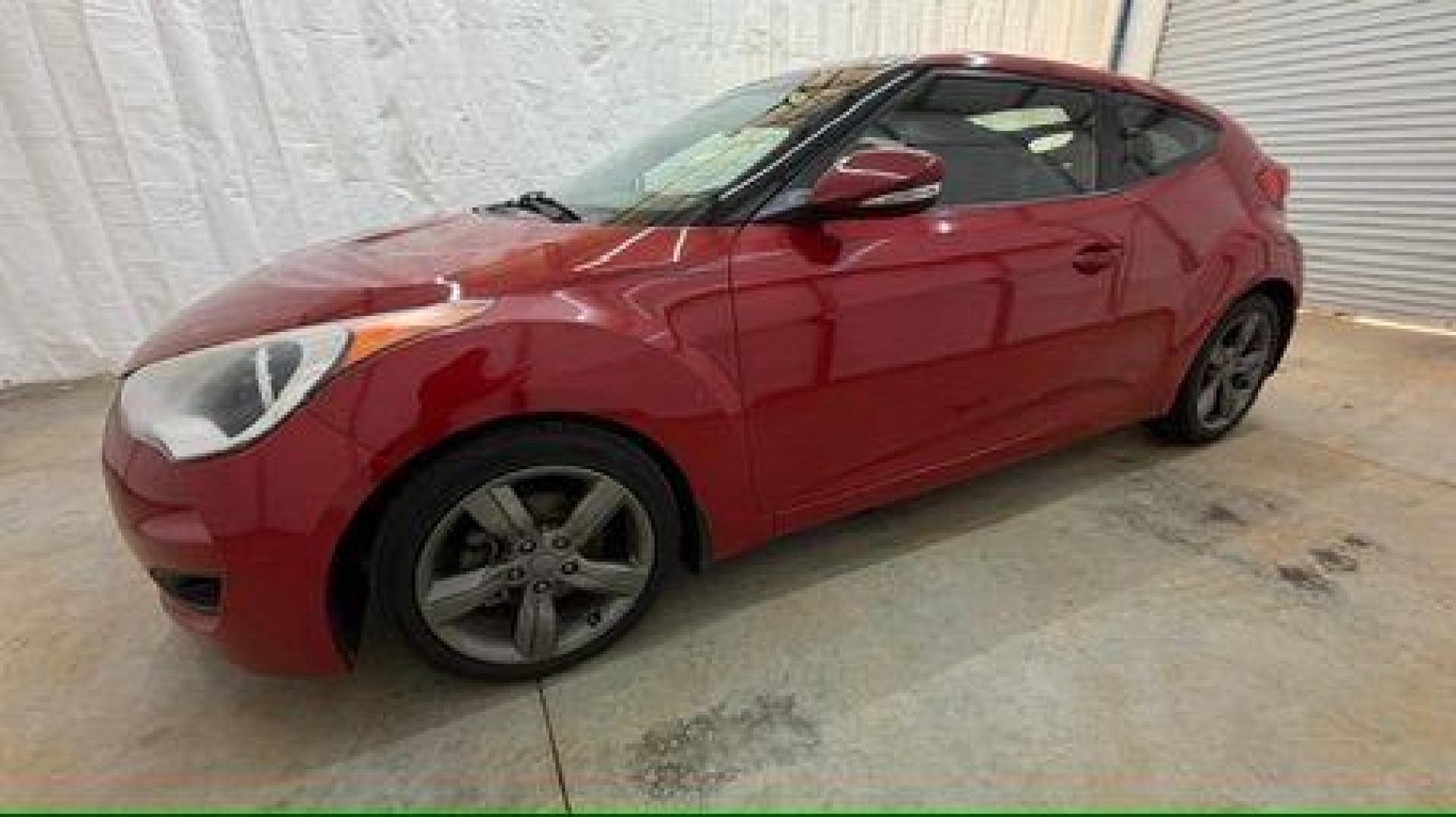 2013 Red Hyundai Veloster Base (KMHTC6ADXDU) with an 1.6L L4 DOHC 16V engine, 6-Speed Automatic transmission, located at 1806 Veterans Memorial Hwy SW, Austell, GA, 30168, (770) 944-9558, 33.817959, -84.606987 - Photo#1