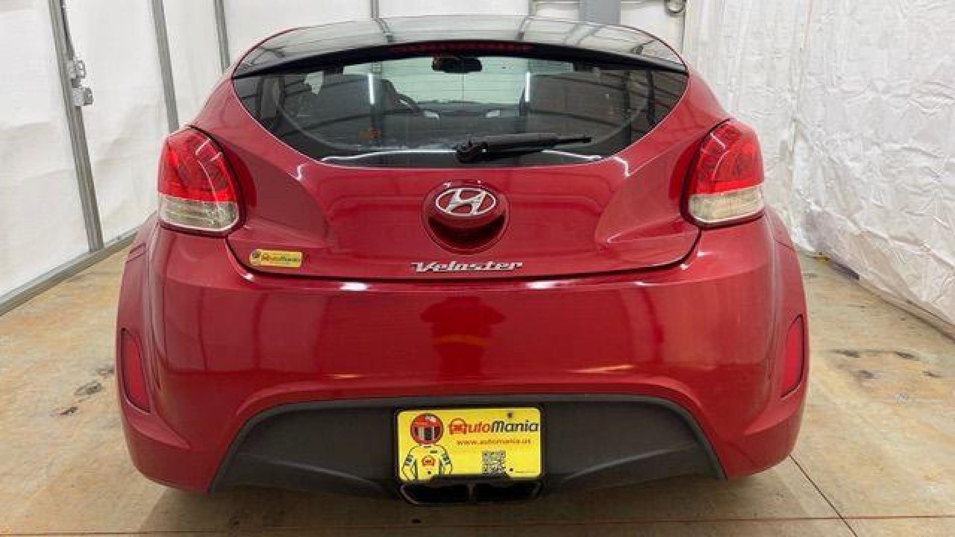2013 Red Hyundai Veloster Base (KMHTC6ADXDU) with an 1.6L L4 DOHC 16V engine, 6-Speed Automatic transmission, located at 1806 Veterans Memorial Hwy SW, Austell, GA, 30168, (770) 944-9558, 33.817959, -84.606987 - Photo#4