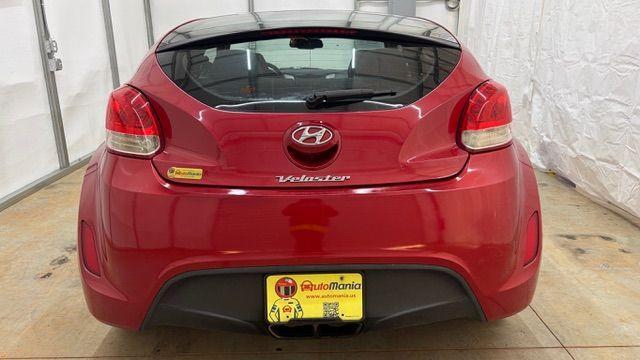 2013 Red Hyundai Veloster Base (KMHTC6ADXDU) with an 1.6L L4 DOHC 16V engine, 6-Speed Automatic transmission, located at 1806 Veterans Memorial Hwy SW, Austell, GA, 30168, (770) 944-9558, 33.817959, -84.606987 - Photo#4