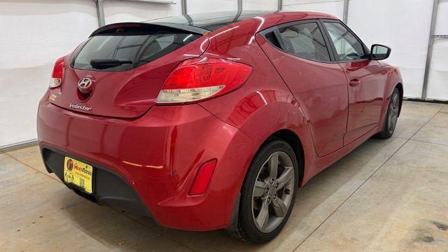 2013 Red Hyundai Veloster Base (KMHTC6ADXDU) with an 1.6L L4 DOHC 16V engine, 6-Speed Automatic transmission, located at 1806 Veterans Memorial Hwy SW, Austell, GA, 30168, (770) 944-9558, 33.817959, -84.606987 - Photo#5