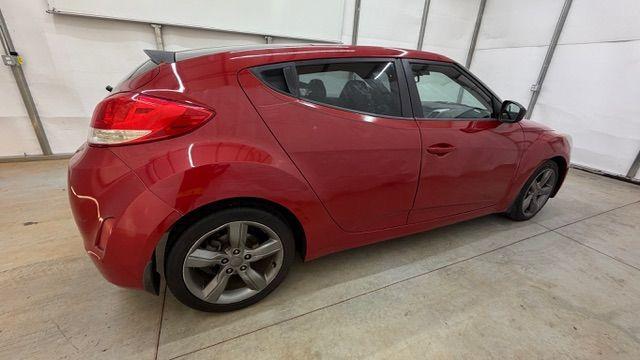 2013 Red Hyundai Veloster Base (KMHTC6ADXDU) with an 1.6L L4 DOHC 16V engine, 6-Speed Automatic transmission, located at 1806 Veterans Memorial Hwy SW, Austell, GA, 30168, (770) 944-9558, 33.817959, -84.606987 - Photo#6