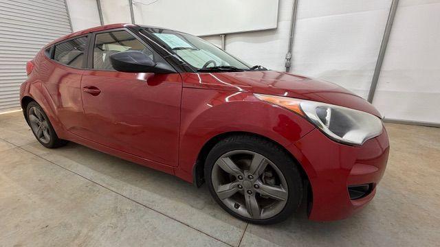 2013 Red Hyundai Veloster Base (KMHTC6ADXDU) with an 1.6L L4 DOHC 16V engine, 6-Speed Automatic transmission, located at 1806 Veterans Memorial Hwy SW, Austell, GA, 30168, (770) 944-9558, 33.817959, -84.606987 - Photo#7