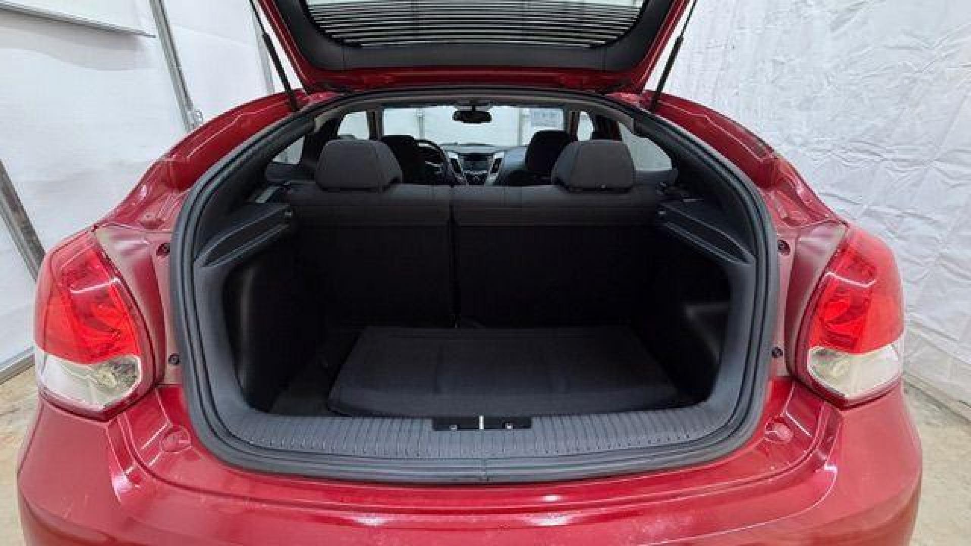 2013 Red Hyundai Veloster Base (KMHTC6ADXDU) with an 1.6L L4 DOHC 16V engine, 6-Speed Automatic transmission, located at 1806 Veterans Memorial Hwy SW, Austell, GA, 30168, (770) 944-9558, 33.817959, -84.606987 - Photo#14