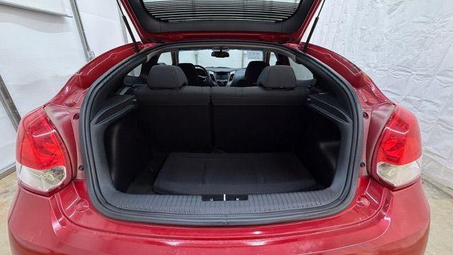 2013 Red Hyundai Veloster Base (KMHTC6ADXDU) with an 1.6L L4 DOHC 16V engine, 6-Speed Automatic transmission, located at 1806 Veterans Memorial Hwy SW, Austell, GA, 30168, (770) 944-9558, 33.817959, -84.606987 - Photo#14
