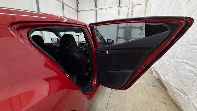2013 Red Hyundai Veloster Base (KMHTC6ADXDU) with an 1.6L L4 DOHC 16V engine, 6-Speed Automatic transmission, located at 1806 Veterans Memorial Hwy SW, Austell, GA, 30168, (770) 944-9558, 33.817959, -84.606987 - Photo#15