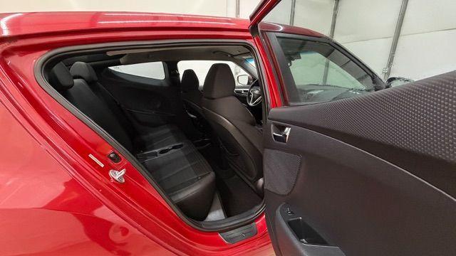 2013 Red Hyundai Veloster Base (KMHTC6ADXDU) with an 1.6L L4 DOHC 16V engine, 6-Speed Automatic transmission, located at 1806 Veterans Memorial Hwy SW, Austell, GA, 30168, (770) 944-9558, 33.817959, -84.606987 - Photo#16