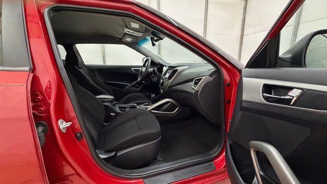 2013 Red Hyundai Veloster Base (KMHTC6ADXDU) with an 1.6L L4 DOHC 16V engine, 6-Speed Automatic transmission, located at 1806 Veterans Memorial Hwy SW, Austell, GA, 30168, (770) 944-9558, 33.817959, -84.606987 - Photo#17