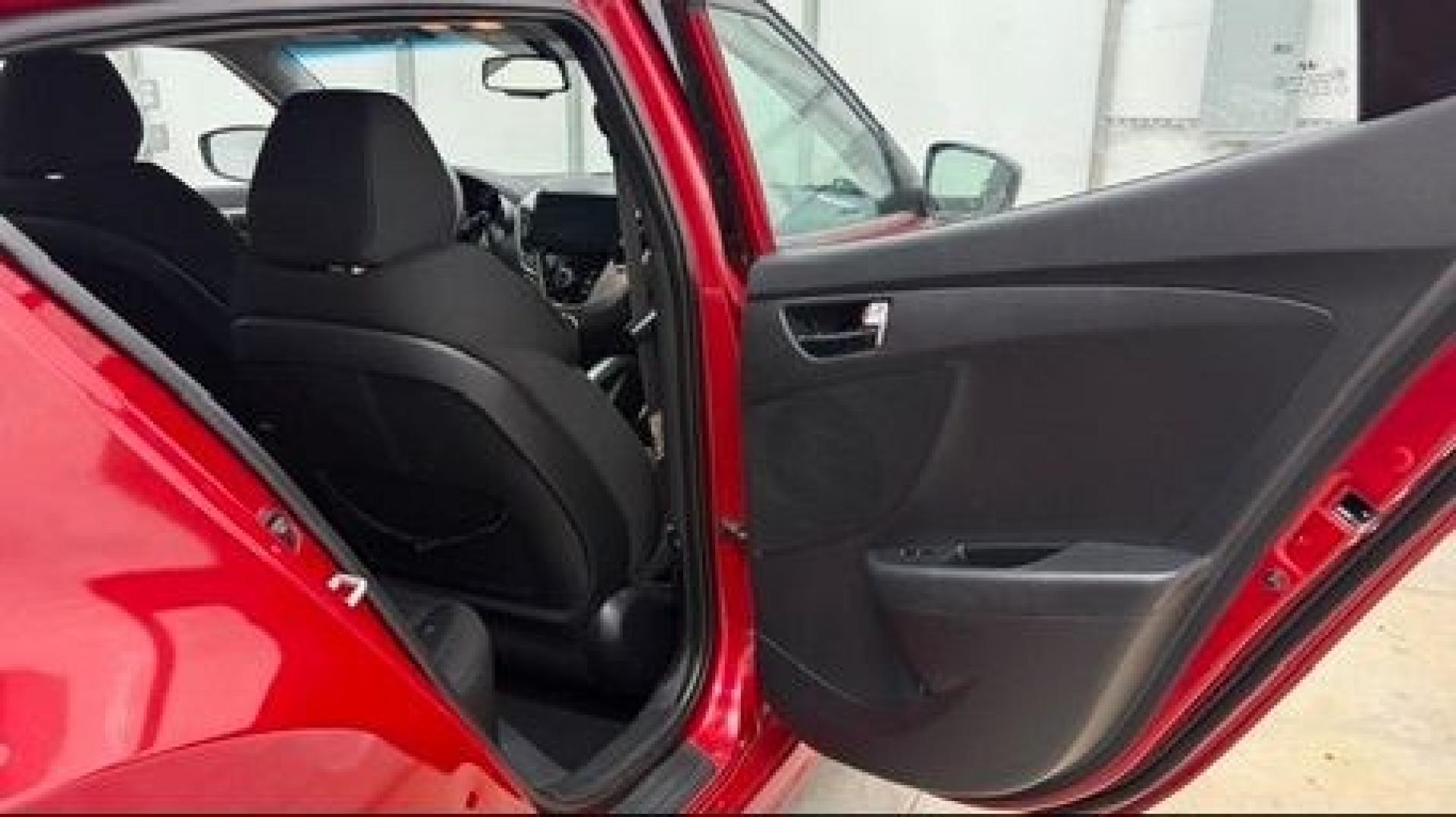 2013 Red Hyundai Veloster Base (KMHTC6ADXDU) with an 1.6L L4 DOHC 16V engine, 6-Speed Automatic transmission, located at 1806 Veterans Memorial Hwy SW, Austell, GA, 30168, (770) 944-9558, 33.817959, -84.606987 - This Veloster is in great overall condition and very clean inside, with a great-looking interior. The driver's seat has a small hole, and the exterior has a few cosmetic scratches, including a small one on the right side door a sporty, head-turning coupe with unique styling.- Photo#11
