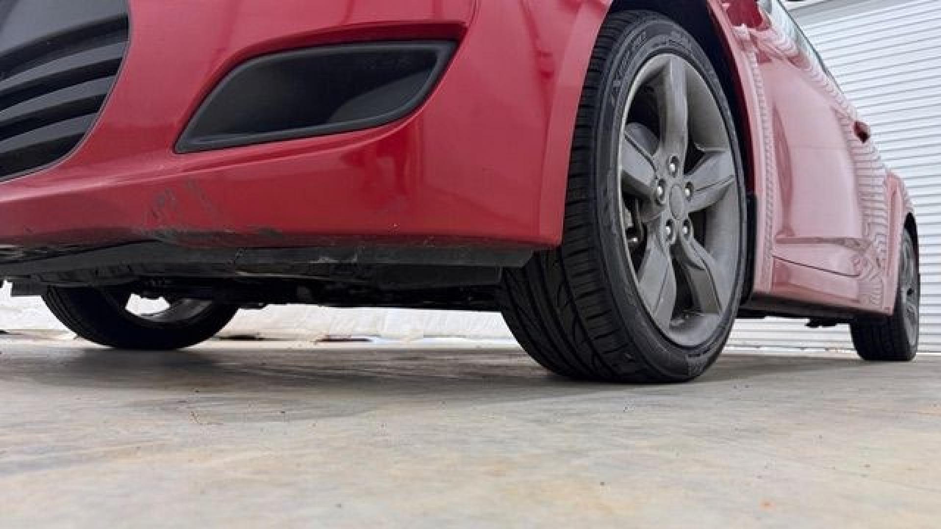 2013 Red Hyundai Veloster Base (KMHTC6ADXDU) with an 1.6L L4 DOHC 16V engine, 6-Speed Automatic transmission, located at 1806 Veterans Memorial Hwy SW, Austell, GA, 30168, (770) 944-9558, 33.817959, -84.606987 - This Veloster is in great overall condition and very clean inside, with a great-looking interior. The driver's seat has a small hole, and the exterior has a few cosmetic scratches, including a small one on the right side door a sporty, head-turning coupe with unique styling.- Photo#17