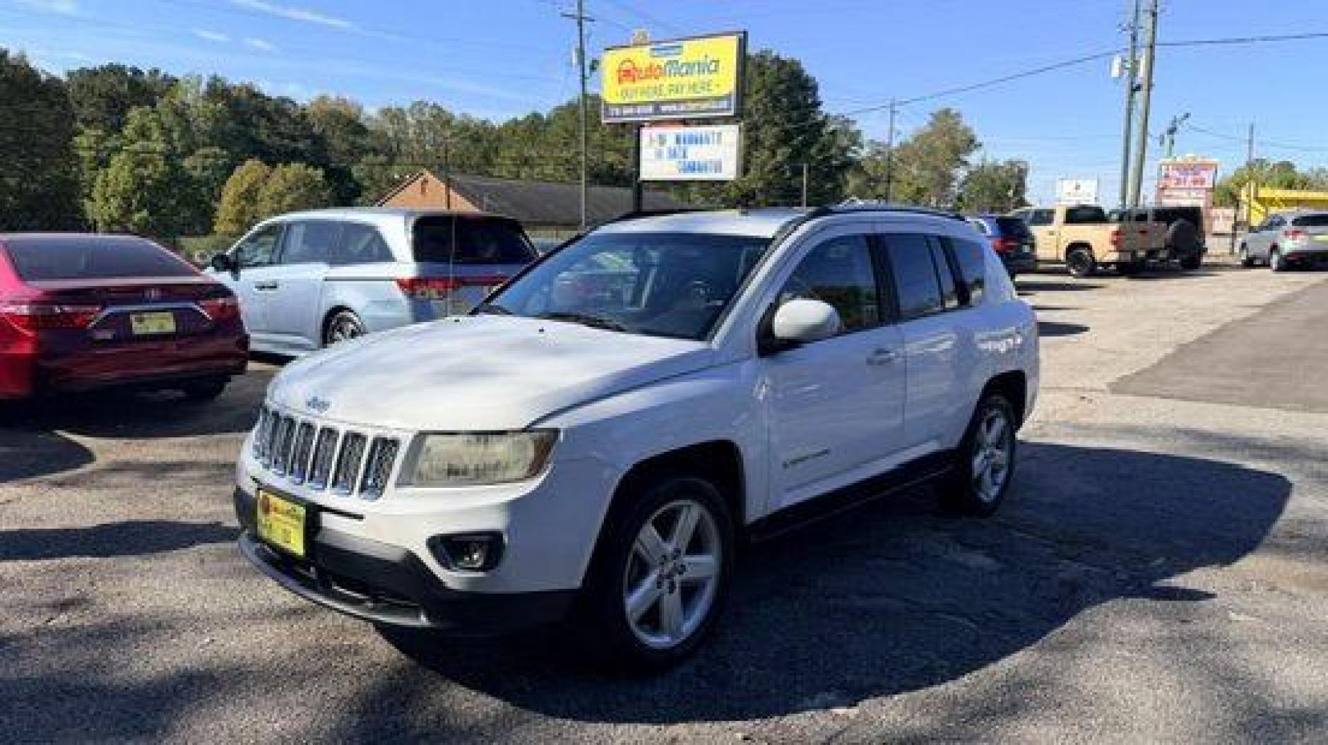2014 White Jeep Compass Latitude FWD (1C4NJCEAXED) with an 2.0L L4 DOHC 16V engine, Continuously Variabl transmission, located at 1806 Veterans Memorial Hwy SW, Austell, GA, 30168, (770) 944-9558, 33.817959, -84.606987 - Photo#0