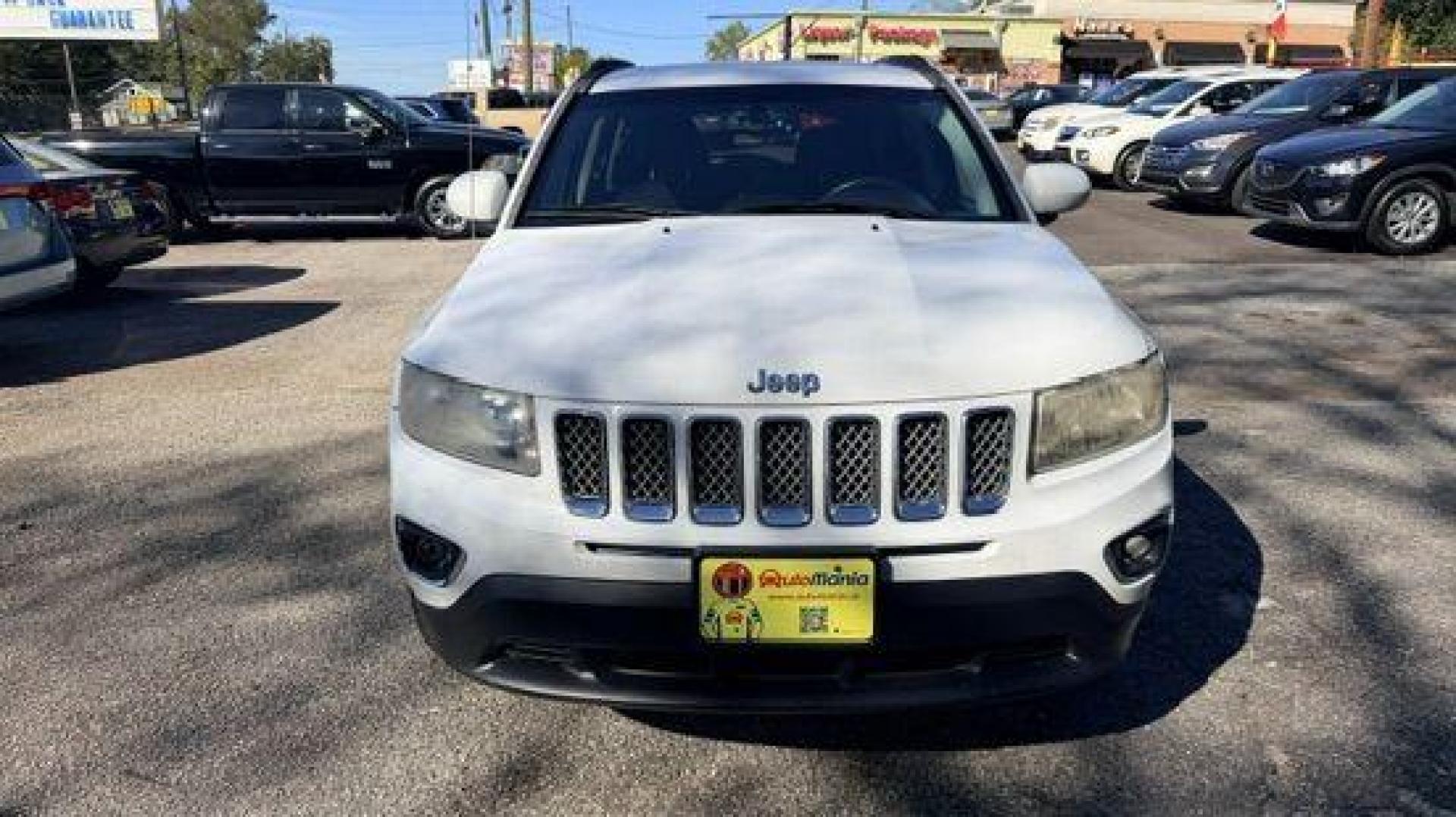 2014 White Jeep Compass Latitude FWD (1C4NJCEAXED) with an 2.0L L4 DOHC 16V engine, Continuously Variabl transmission, located at 1806 Veterans Memorial Hwy SW, Austell, GA, 30168, (770) 944-9558, 33.817959, -84.606987 - Photo#1