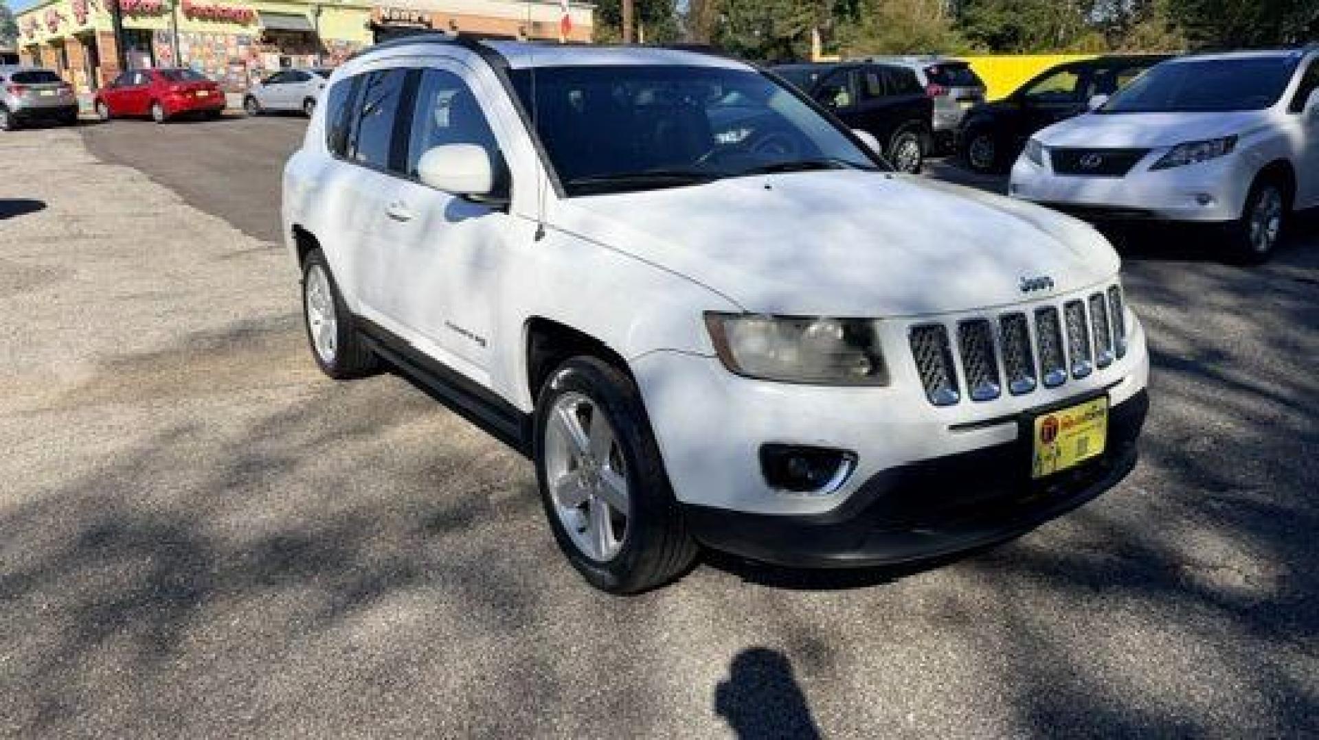 2014 White Jeep Compass Latitude FWD (1C4NJCEAXED) with an 2.0L L4 DOHC 16V engine, Continuously Variabl transmission, located at 1806 Veterans Memorial Hwy SW, Austell, GA, 30168, (770) 944-9558, 33.817959, -84.606987 - Photo#2