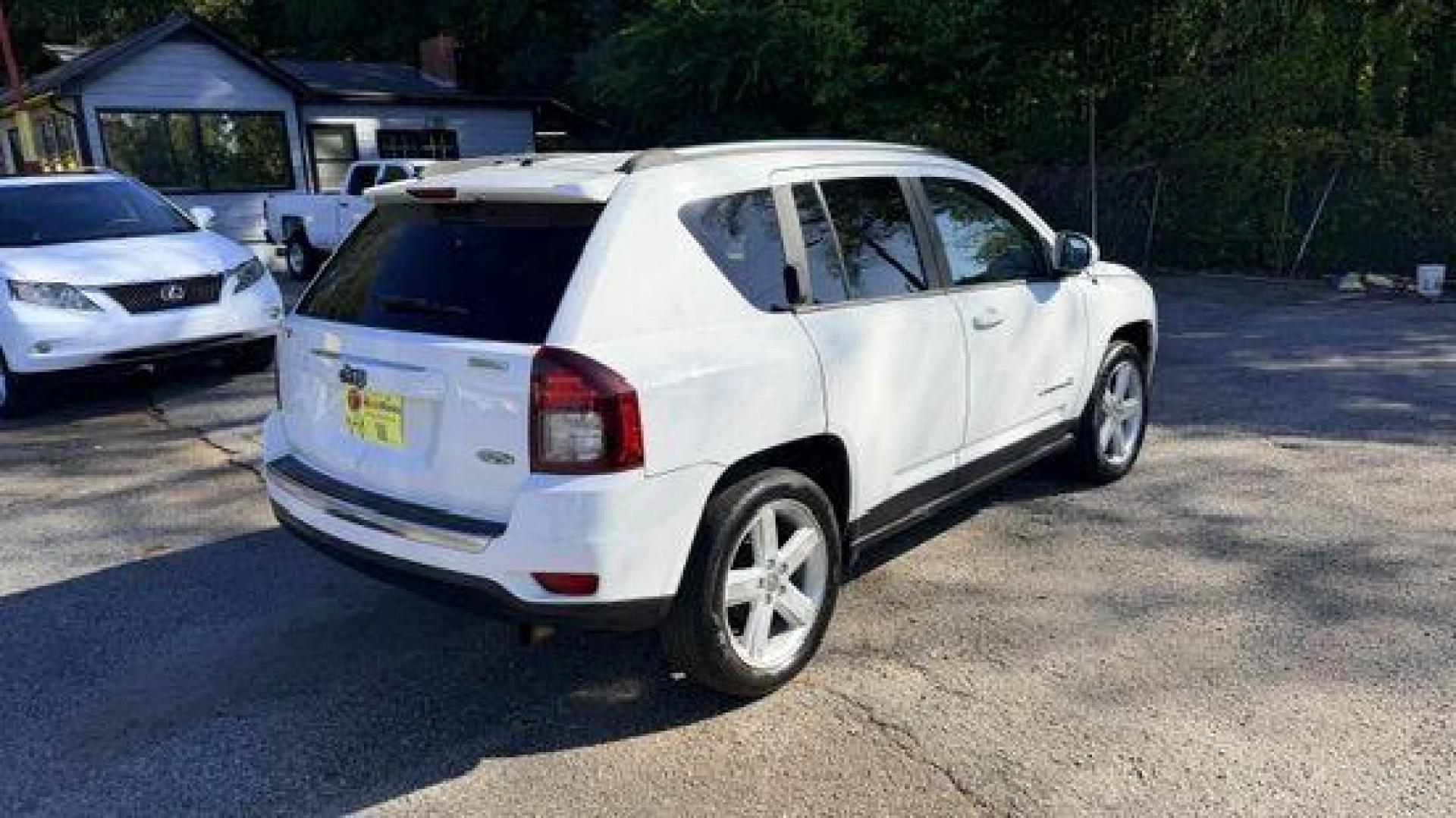 2014 White Jeep Compass Latitude FWD (1C4NJCEAXED) with an 2.0L L4 DOHC 16V engine, Continuously Variabl transmission, located at 1806 Veterans Memorial Hwy SW, Austell, GA, 30168, (770) 944-9558, 33.817959, -84.606987 - Photo#3
