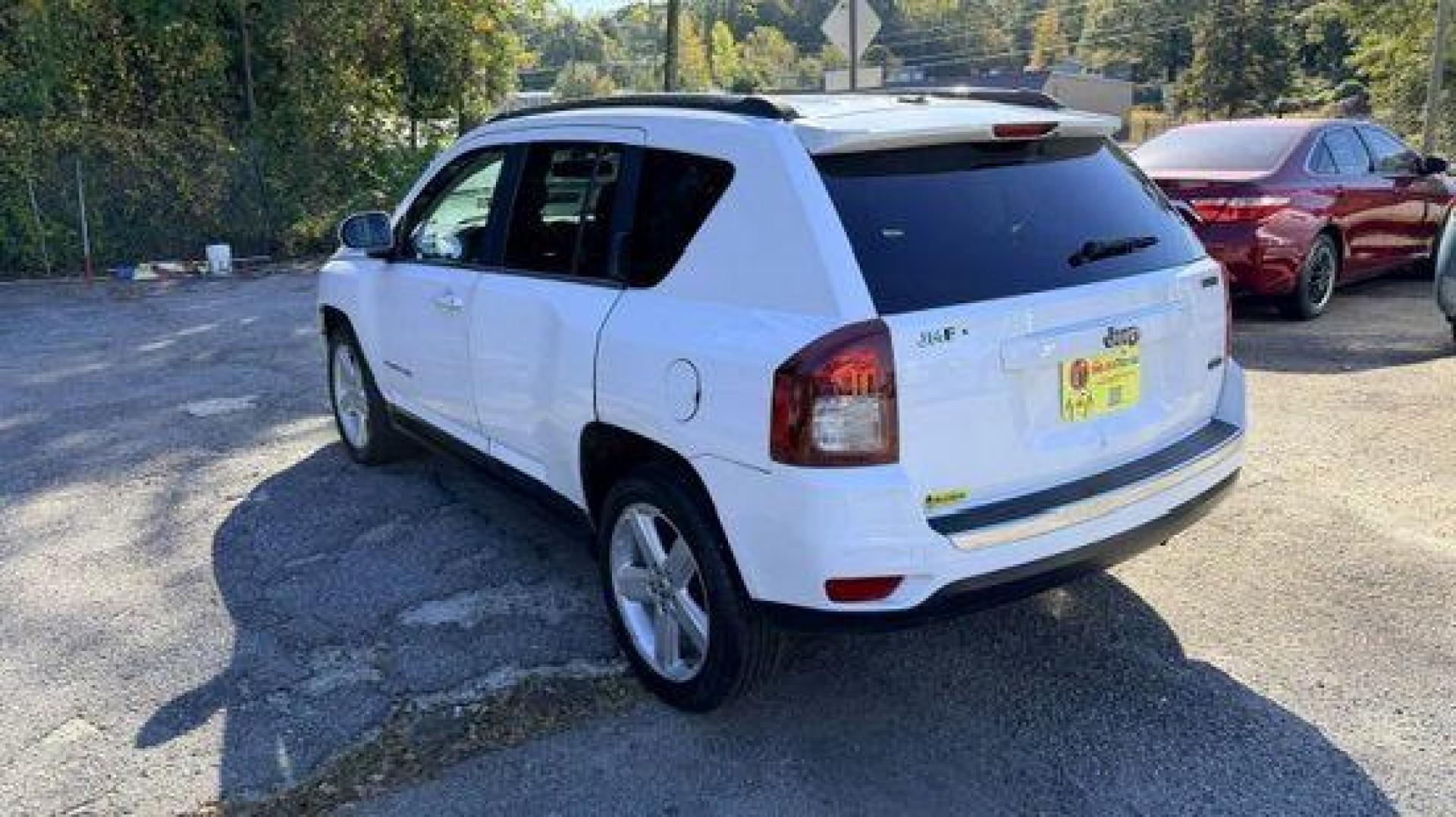 2014 White Jeep Compass Latitude FWD (1C4NJCEAXED) with an 2.0L L4 DOHC 16V engine, Continuously Variabl transmission, located at 1806 Veterans Memorial Hwy SW, Austell, GA, 30168, (770) 944-9558, 33.817959, -84.606987 - Photo#5
