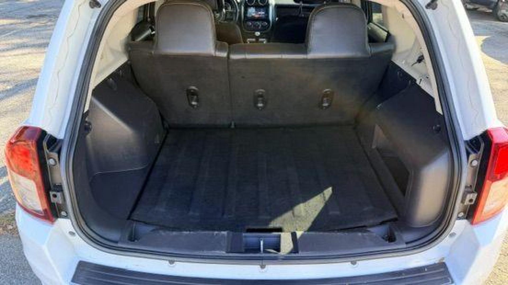 2014 White Jeep Compass Latitude FWD (1C4NJCEAXED) with an 2.0L L4 DOHC 16V engine, Continuously Variabl transmission, located at 1806 Veterans Memorial Hwy SW, Austell, GA, 30168, (770) 944-9558, 33.817959, -84.606987 - Photo#6