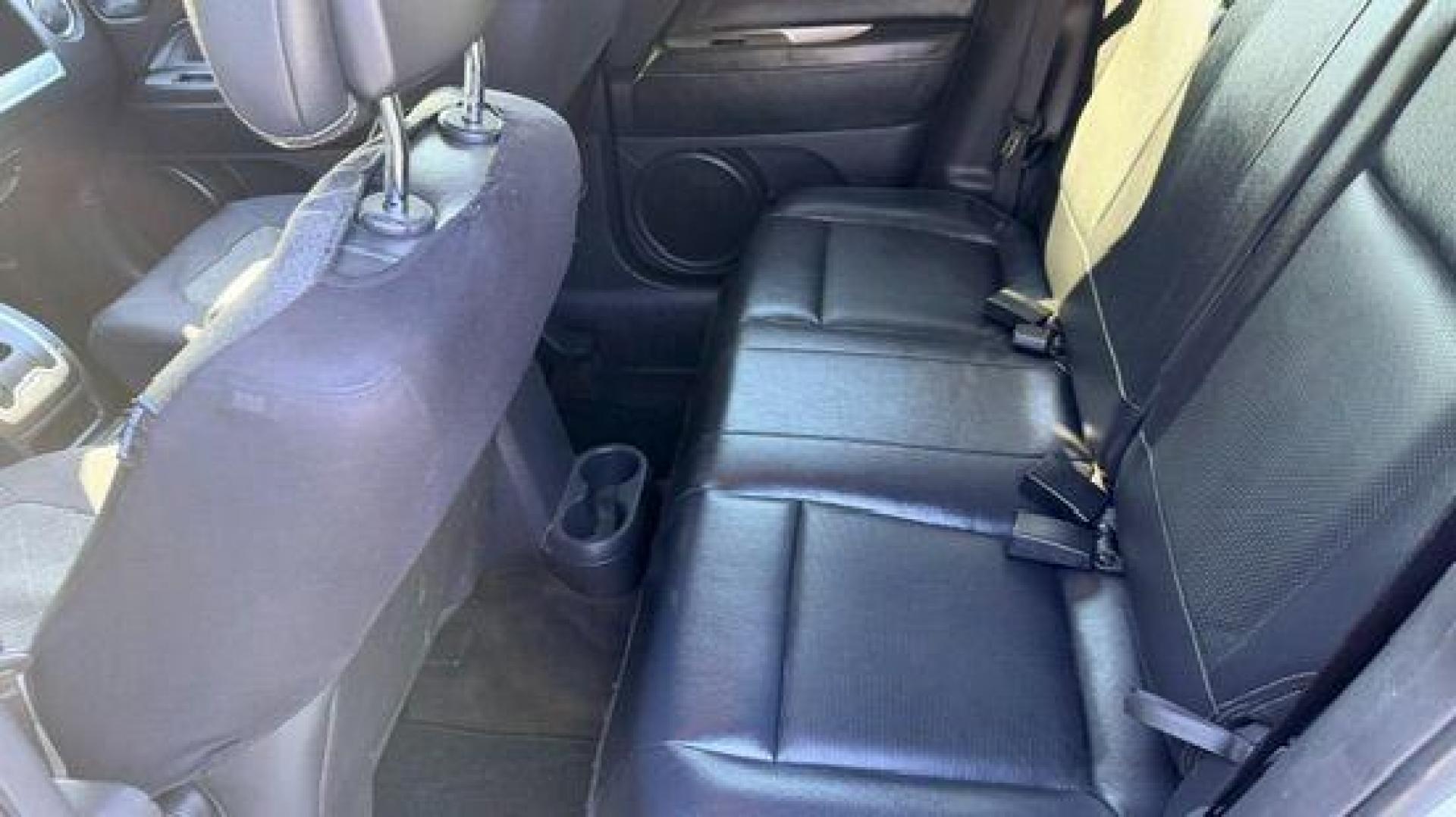 2014 White Jeep Compass Latitude FWD (1C4NJCEAXED) with an 2.0L L4 DOHC 16V engine, Continuously Variabl transmission, located at 1806 Veterans Memorial Hwy SW, Austell, GA, 30168, (770) 944-9558, 33.817959, -84.606987 - Photo#7