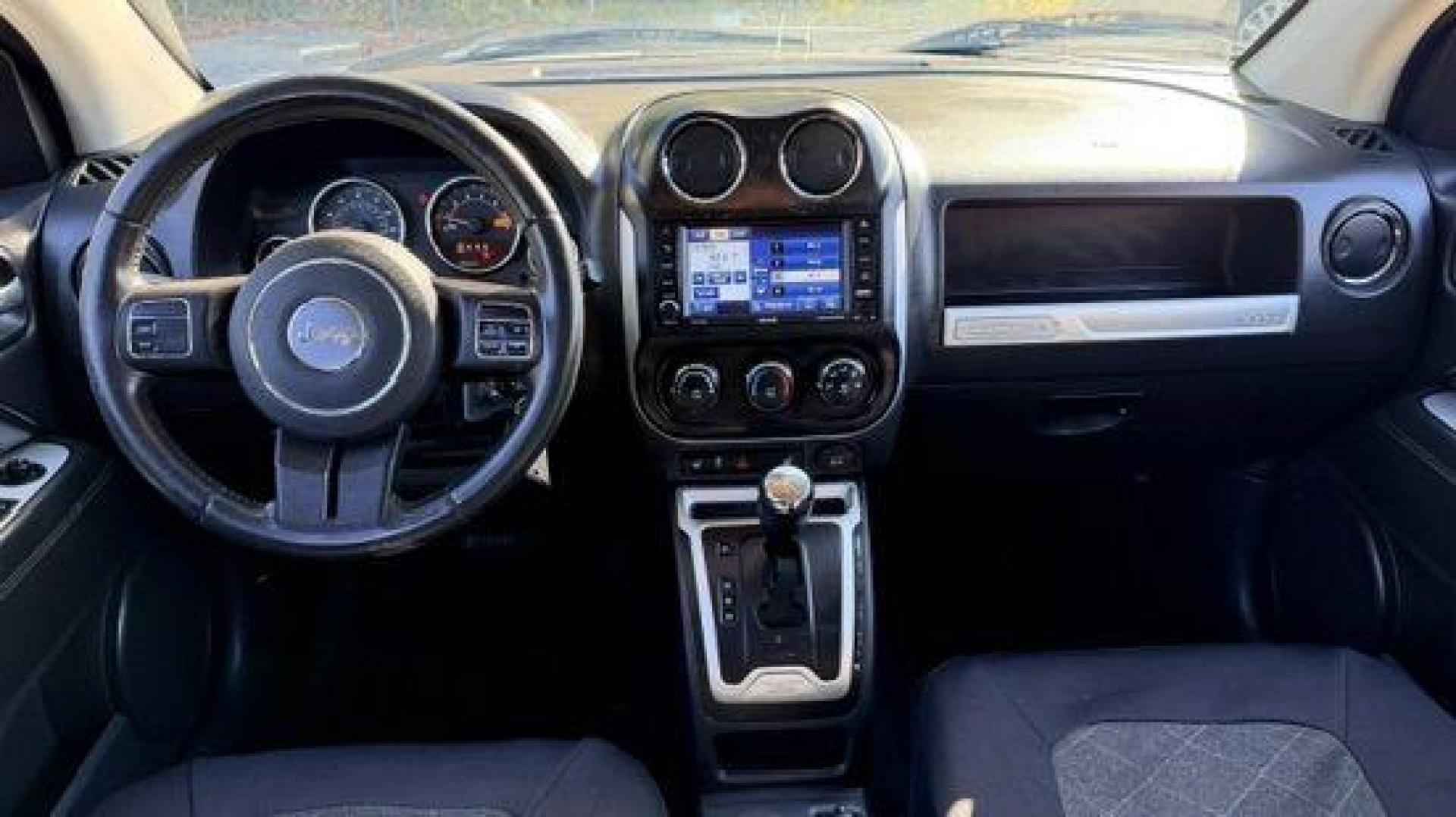 2014 White Jeep Compass Latitude FWD (1C4NJCEAXED) with an 2.0L L4 DOHC 16V engine, Continuously Variabl transmission, located at 1806 Veterans Memorial Hwy SW, Austell, GA, 30168, (770) 944-9558, 33.817959, -84.606987 - Photo#8