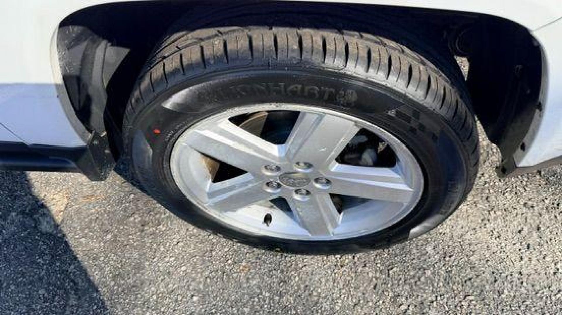 2014 White Jeep Compass Latitude FWD (1C4NJCEAXED) with an 2.0L L4 DOHC 16V engine, Continuously Variabl transmission, located at 1806 Veterans Memorial Hwy SW, Austell, GA, 30168, (770) 944-9558, 33.817959, -84.606987 - Photo#10