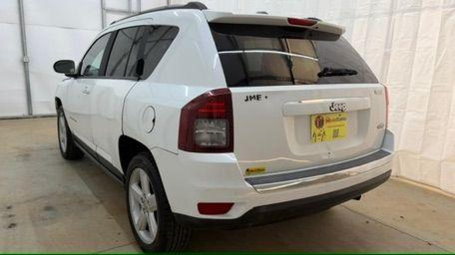 2014 White Jeep Compass Latitude FWD (1C4NJCEAXED) with an 2.0L L4 DOHC 16V engine, Continuously Variabl transmission, located at 1806 Veterans Memorial Hwy SW, Austell, GA, 30168, (770) 944-9558, 33.817959, -84.606987 - Photo#3