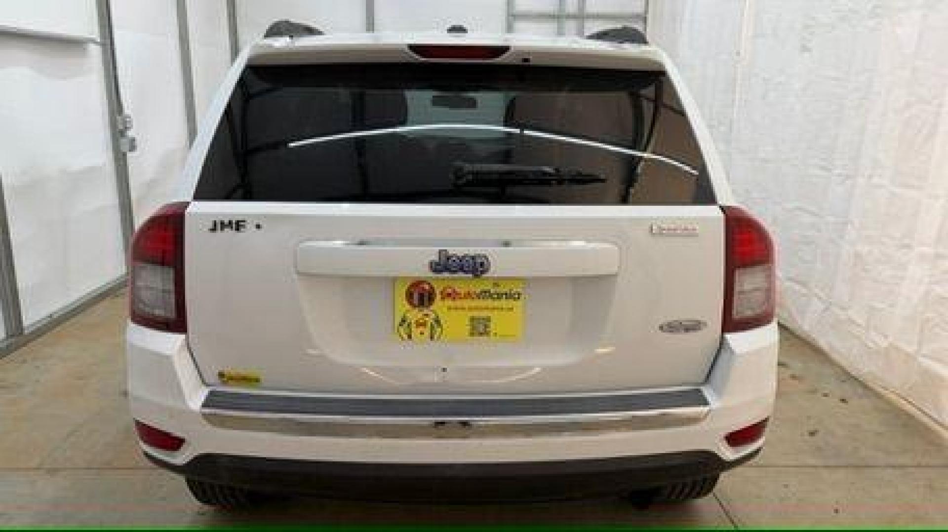 2014 White Jeep Compass Latitude FWD (1C4NJCEAXED) with an 2.0L L4 DOHC 16V engine, Continuously Variabl transmission, located at 1806 Veterans Memorial Hwy SW, Austell, GA, 30168, (770) 944-9558, 33.817959, -84.606987 - Photo#4