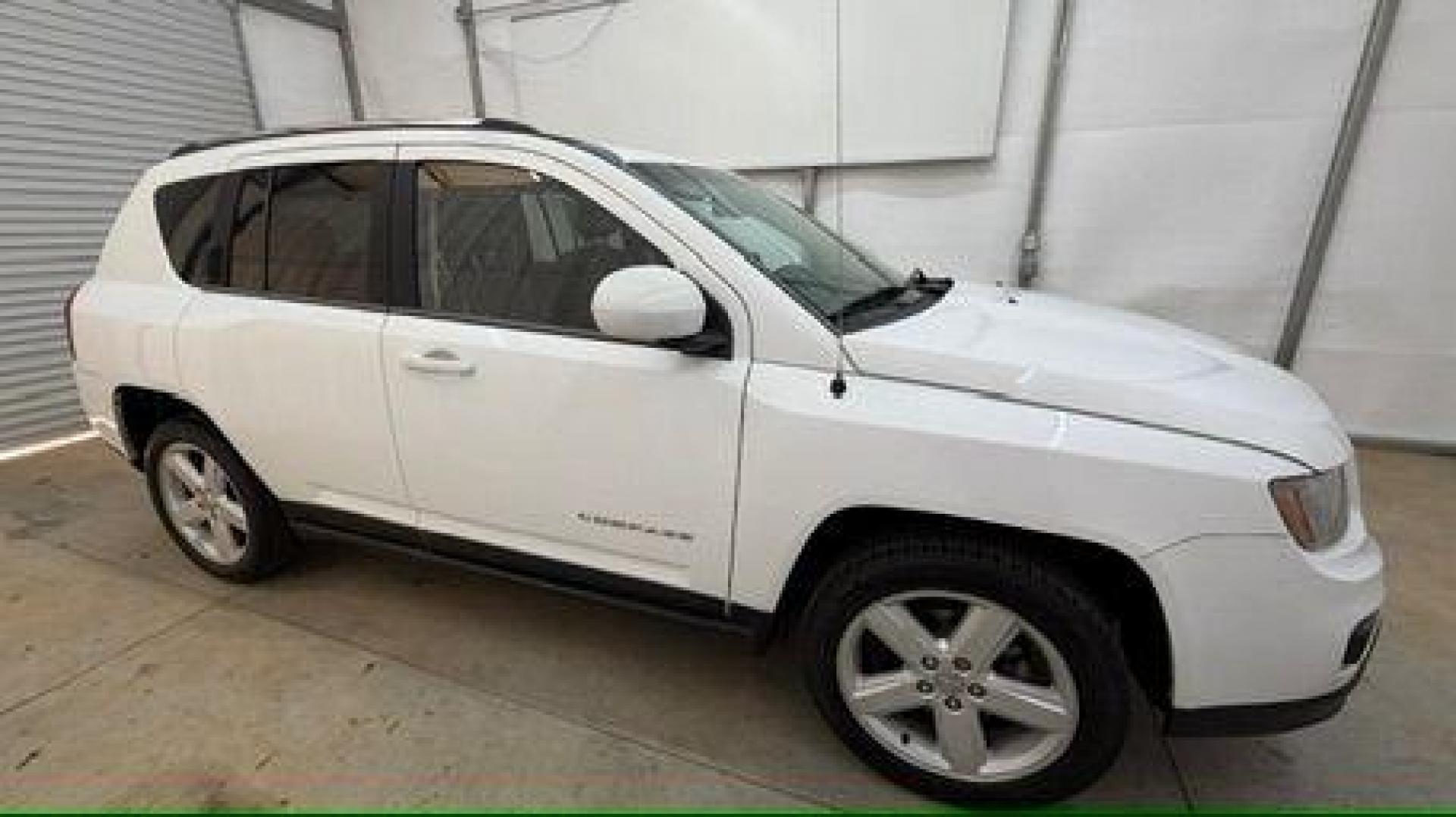 2014 White Jeep Compass Latitude FWD (1C4NJCEAXED) with an 2.0L L4 DOHC 16V engine, Continuously Variabl transmission, located at 1806 Veterans Memorial Hwy SW, Austell, GA, 30168, (770) 944-9558, 33.817959, -84.606987 - Photo#7