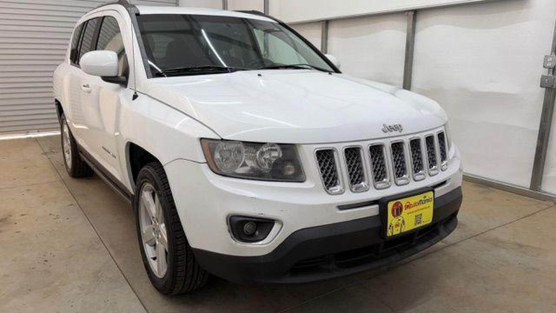 2014 White Jeep Compass Latitude FWD (1C4NJCEAXED) with an 2.0L L4 DOHC 16V engine, Continuously Variabl transmission, located at 1806 Veterans Memorial Hwy SW, Austell, GA, 30168, (770) 944-9558, 33.817959, -84.606987 - Photo#8