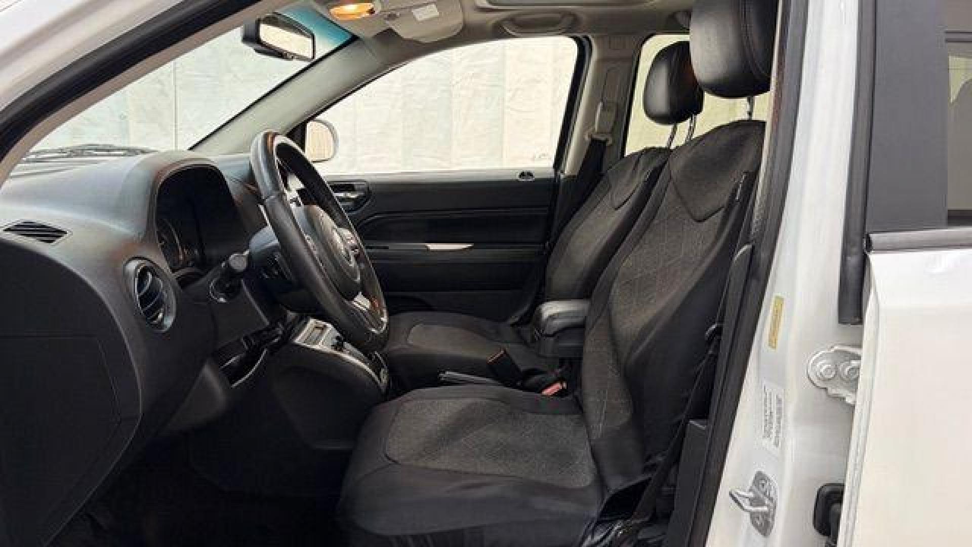 2014 White Jeep Compass Latitude FWD (1C4NJCEAXED) with an 2.0L L4 DOHC 16V engine, Continuously Variabl transmission, located at 1806 Veterans Memorial Hwy SW, Austell, GA, 30168, (770) 944-9558, 33.817959, -84.606987 - Photo#11