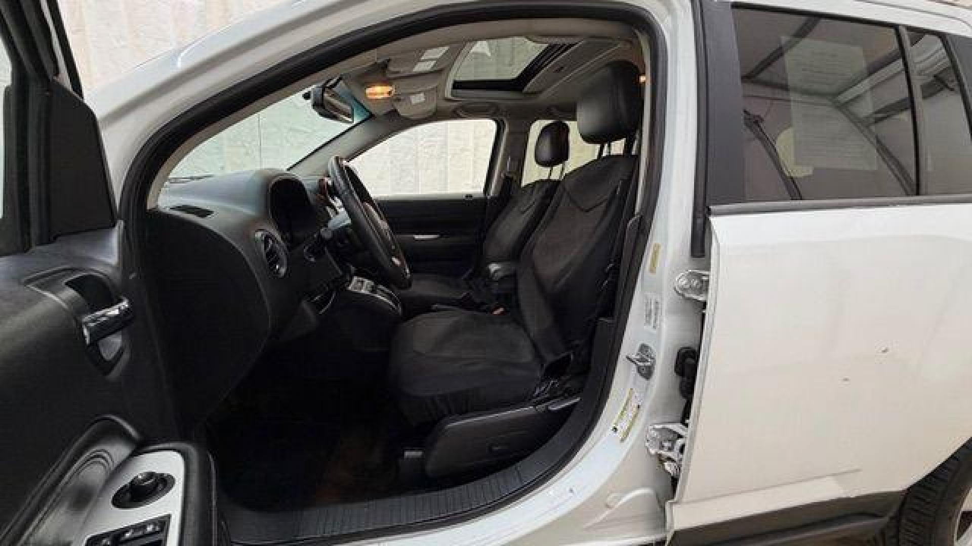 2014 White Jeep Compass Latitude FWD (1C4NJCEAXED) with an 2.0L L4 DOHC 16V engine, Continuously Variabl transmission, located at 1806 Veterans Memorial Hwy SW, Austell, GA, 30168, (770) 944-9558, 33.817959, -84.606987 - Photo#12