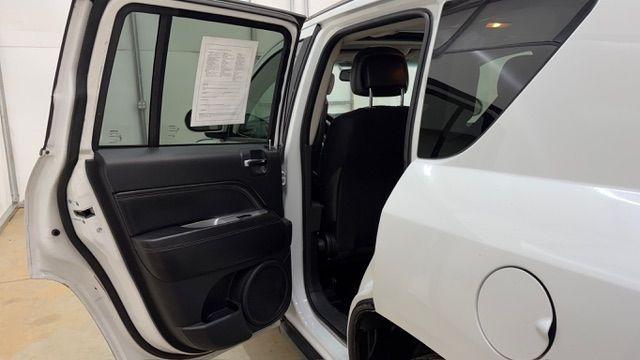 2014 White Jeep Compass Latitude FWD (1C4NJCEAXED) with an 2.0L L4 DOHC 16V engine, Continuously Variabl transmission, located at 1806 Veterans Memorial Hwy SW, Austell, GA, 30168, (770) 944-9558, 33.817959, -84.606987 - Photo#13