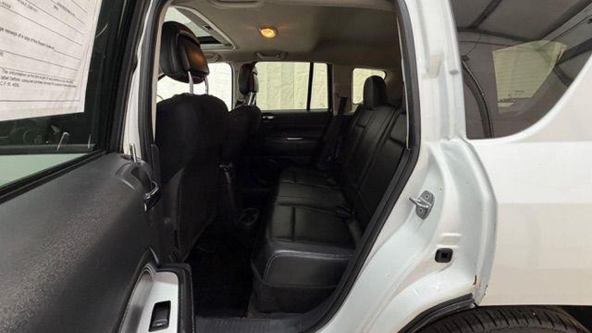 2014 White Jeep Compass Latitude FWD (1C4NJCEAXED) with an 2.0L L4 DOHC 16V engine, Continuously Variabl transmission, located at 1806 Veterans Memorial Hwy SW, Austell, GA, 30168, (770) 944-9558, 33.817959, -84.606987 - Photo#14