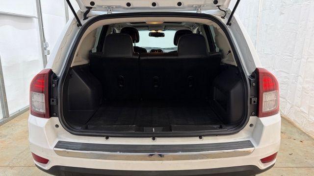 2014 White Jeep Compass Latitude FWD (1C4NJCEAXED) with an 2.0L L4 DOHC 16V engine, Continuously Variabl transmission, located at 1806 Veterans Memorial Hwy SW, Austell, GA, 30168, (770) 944-9558, 33.817959, -84.606987 - Photo#16