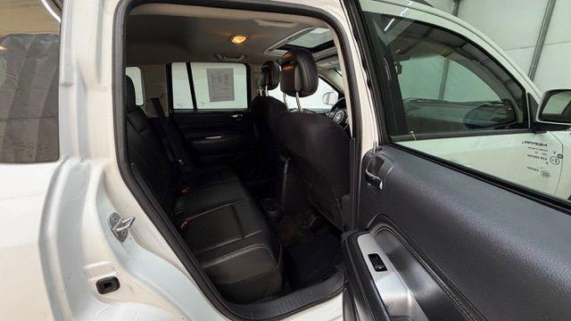 2014 White Jeep Compass Latitude FWD (1C4NJCEAXED) with an 2.0L L4 DOHC 16V engine, Continuously Variabl transmission, located at 1806 Veterans Memorial Hwy SW, Austell, GA, 30168, (770) 944-9558, 33.817959, -84.606987 - Photo#17