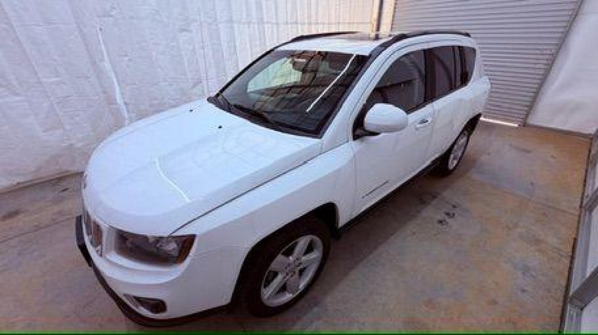 2014 White Jeep Compass Latitude FWD (1C4NJCEAXED) with an 2.0L L4 DOHC 16V engine, Continuously Variabl transmission, located at 1806 Veterans Memorial Hwy SW, Austell, GA, 30168, (770) 944-9558, 33.817959, -84.606987 - Photo#1