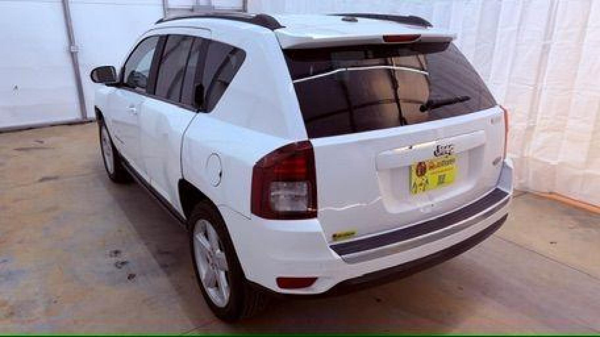 2014 White Jeep Compass Latitude FWD (1C4NJCEAXED) with an 2.0L L4 DOHC 16V engine, Continuously Variabl transmission, located at 1806 Veterans Memorial Hwy SW, Austell, GA, 30168, (770) 944-9558, 33.817959, -84.606987 - Photo#3