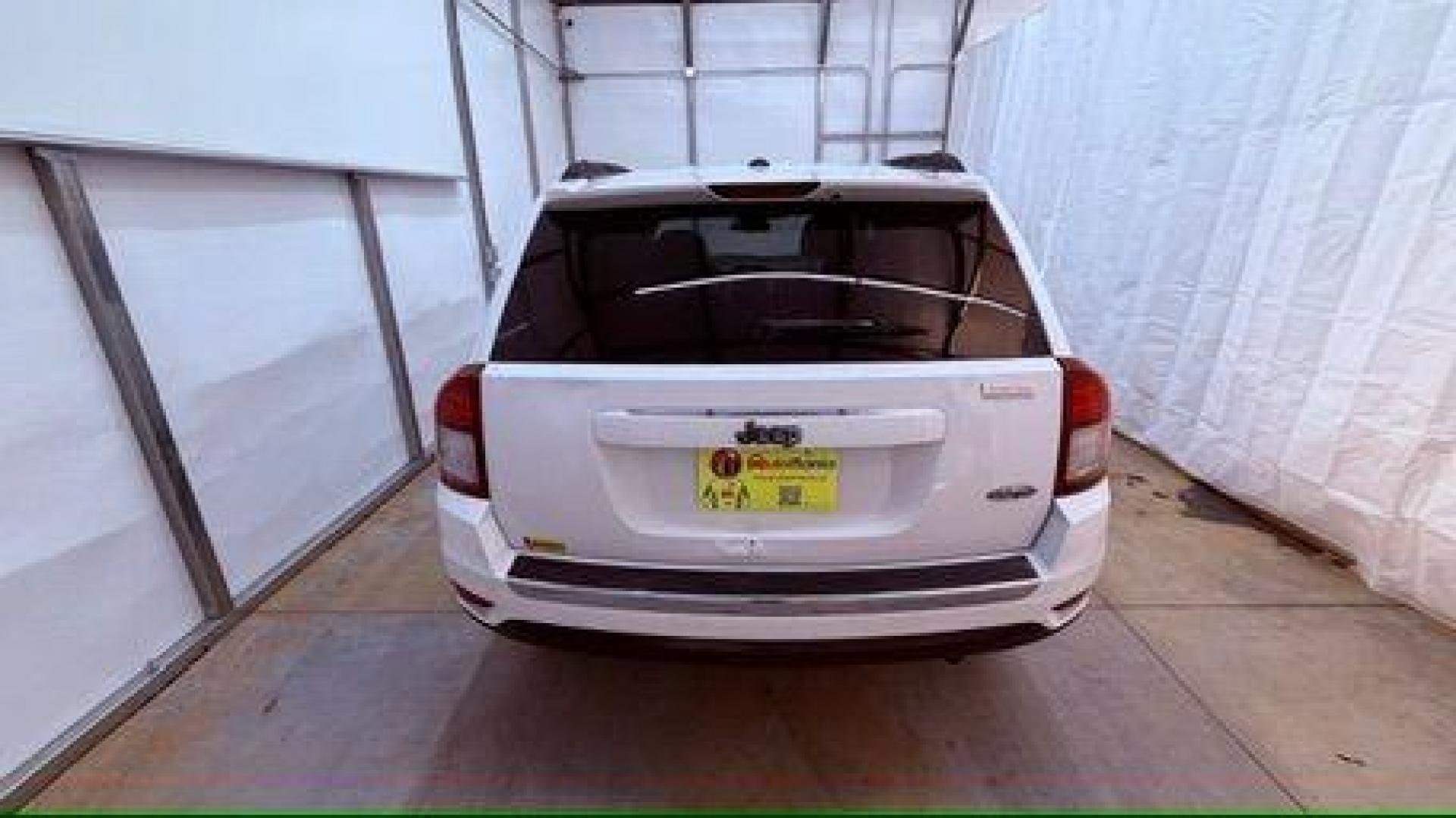 2014 White Jeep Compass Latitude FWD (1C4NJCEAXED) with an 2.0L L4 DOHC 16V engine, Continuously Variabl transmission, located at 1806 Veterans Memorial Hwy SW, Austell, GA, 30168, (770) 944-9558, 33.817959, -84.606987 - Photo#4