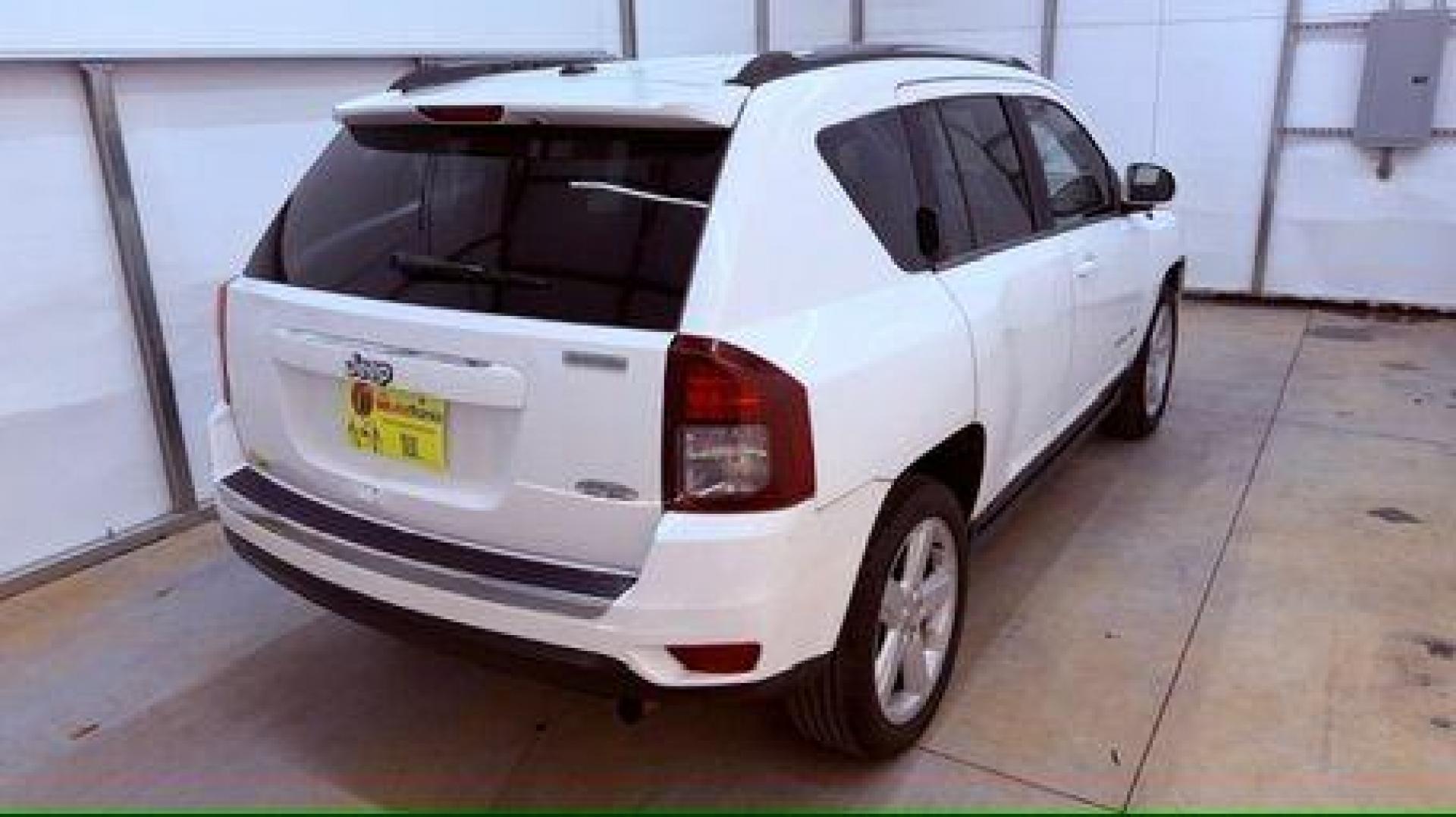 2014 White Jeep Compass Latitude FWD (1C4NJCEAXED) with an 2.0L L4 DOHC 16V engine, Continuously Variabl transmission, located at 1806 Veterans Memorial Hwy SW, Austell, GA, 30168, (770) 944-9558, 33.817959, -84.606987 - Photo#5