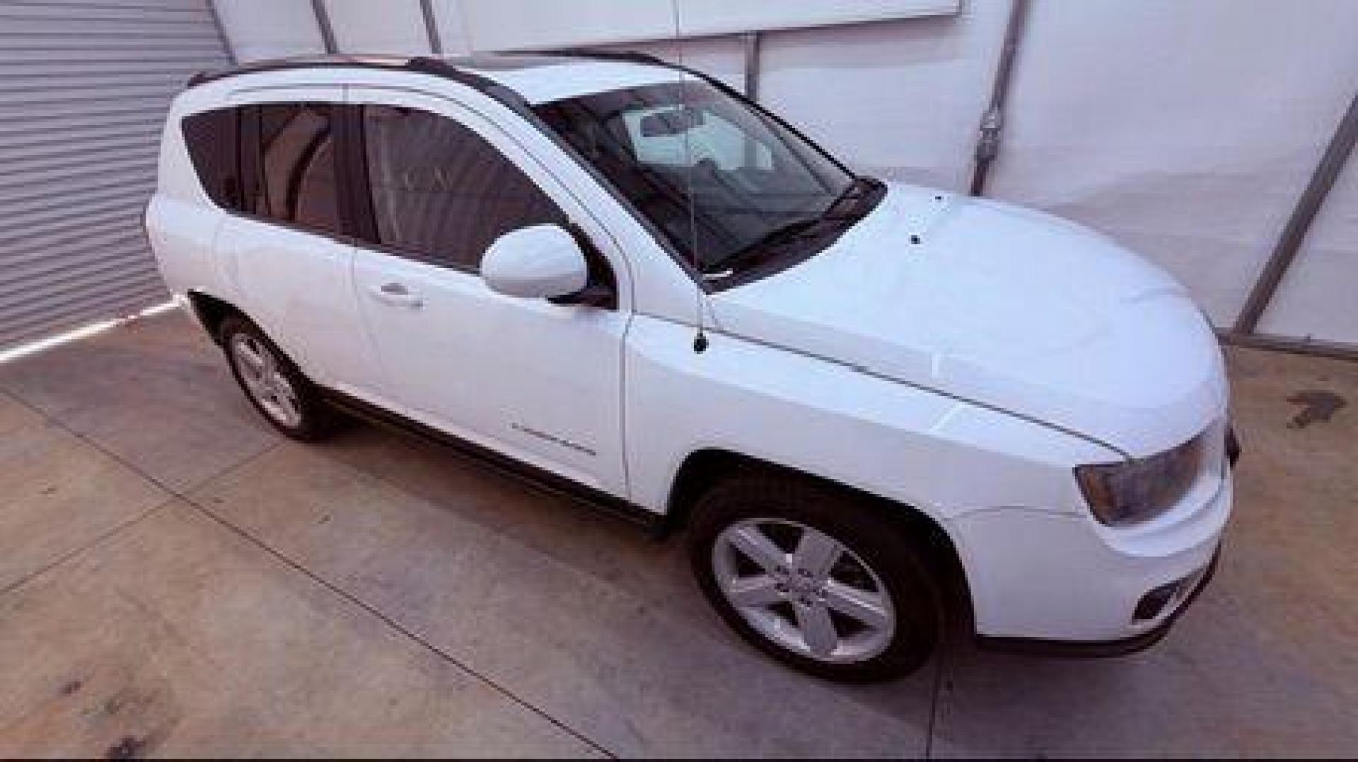 2014 White Jeep Compass Latitude FWD (1C4NJCEAXED) with an 2.0L L4 DOHC 16V engine, Continuously Variabl transmission, located at 1806 Veterans Memorial Hwy SW, Austell, GA, 30168, (770) 944-9558, 33.817959, -84.606987 - Photo#7