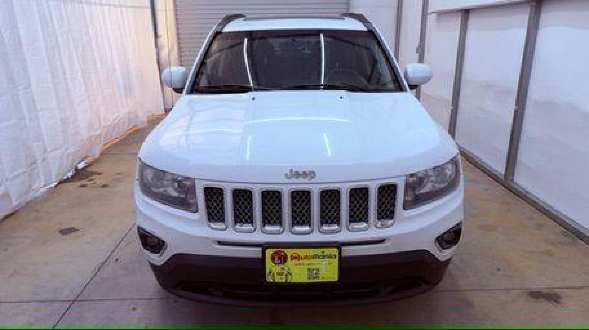 2014 White Jeep Compass Latitude FWD (1C4NJCEAXED) with an 2.0L L4 DOHC 16V engine, Continuously Variabl transmission, located at 1806 Veterans Memorial Hwy SW, Austell, GA, 30168, (770) 944-9558, 33.817959, -84.606987 - Photo#9