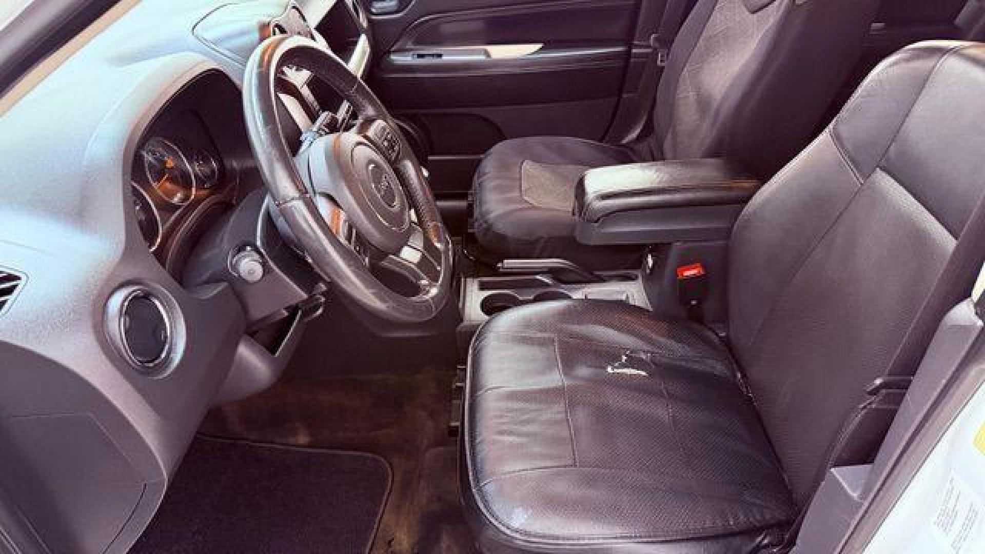 2014 White Jeep Compass Latitude FWD (1C4NJCEAXED) with an 2.0L L4 DOHC 16V engine, Continuously Variabl transmission, located at 1806 Veterans Memorial Hwy SW, Austell, GA, 30168, (770) 944-9558, 33.817959, -84.606987 - Photo#12