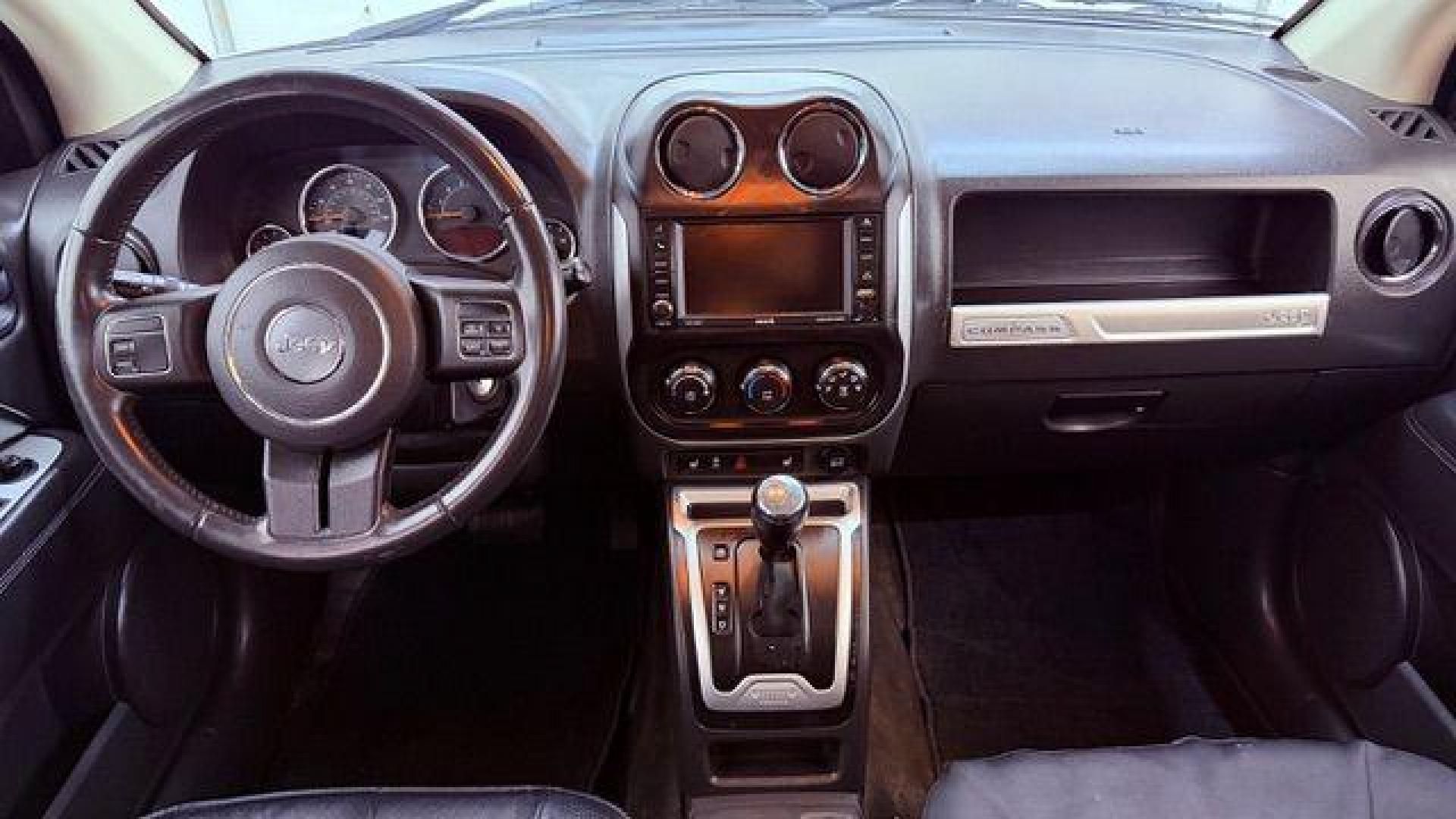 2014 White Jeep Compass Latitude FWD (1C4NJCEAXED) with an 2.0L L4 DOHC 16V engine, Continuously Variabl transmission, located at 1806 Veterans Memorial Hwy SW, Austell, GA, 30168, (770) 944-9558, 33.817959, -84.606987 - Photo#15