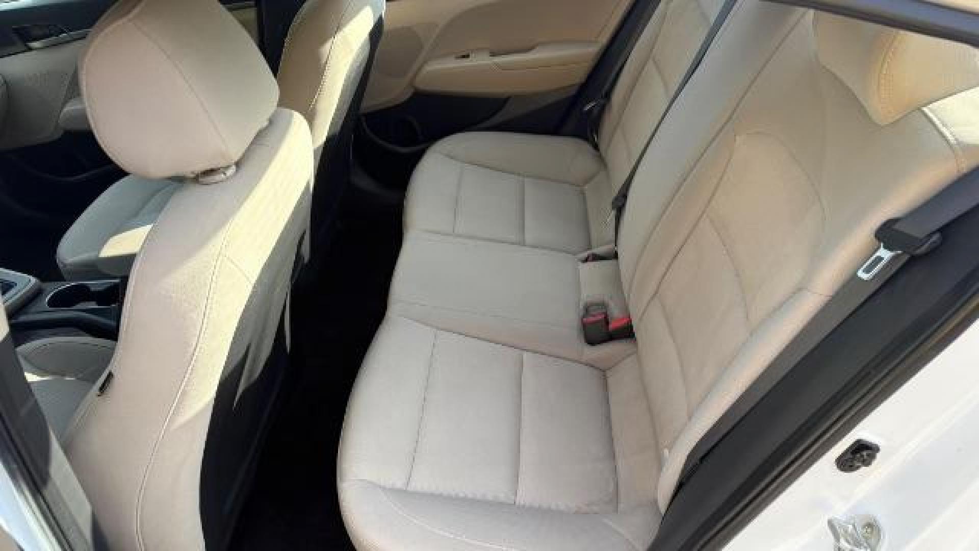 2017 White Hyundai Elantra SE 6AT (5NPD74LF3HH) with an 1.8L L4 DOHC 16V engine, 6-Speed Automatic transmission, located at 1806 Veterans Memorial Hwy SW, Austell, GA, 30168, (770) 944-9558, 33.817959, -84.606987 - Photo#6