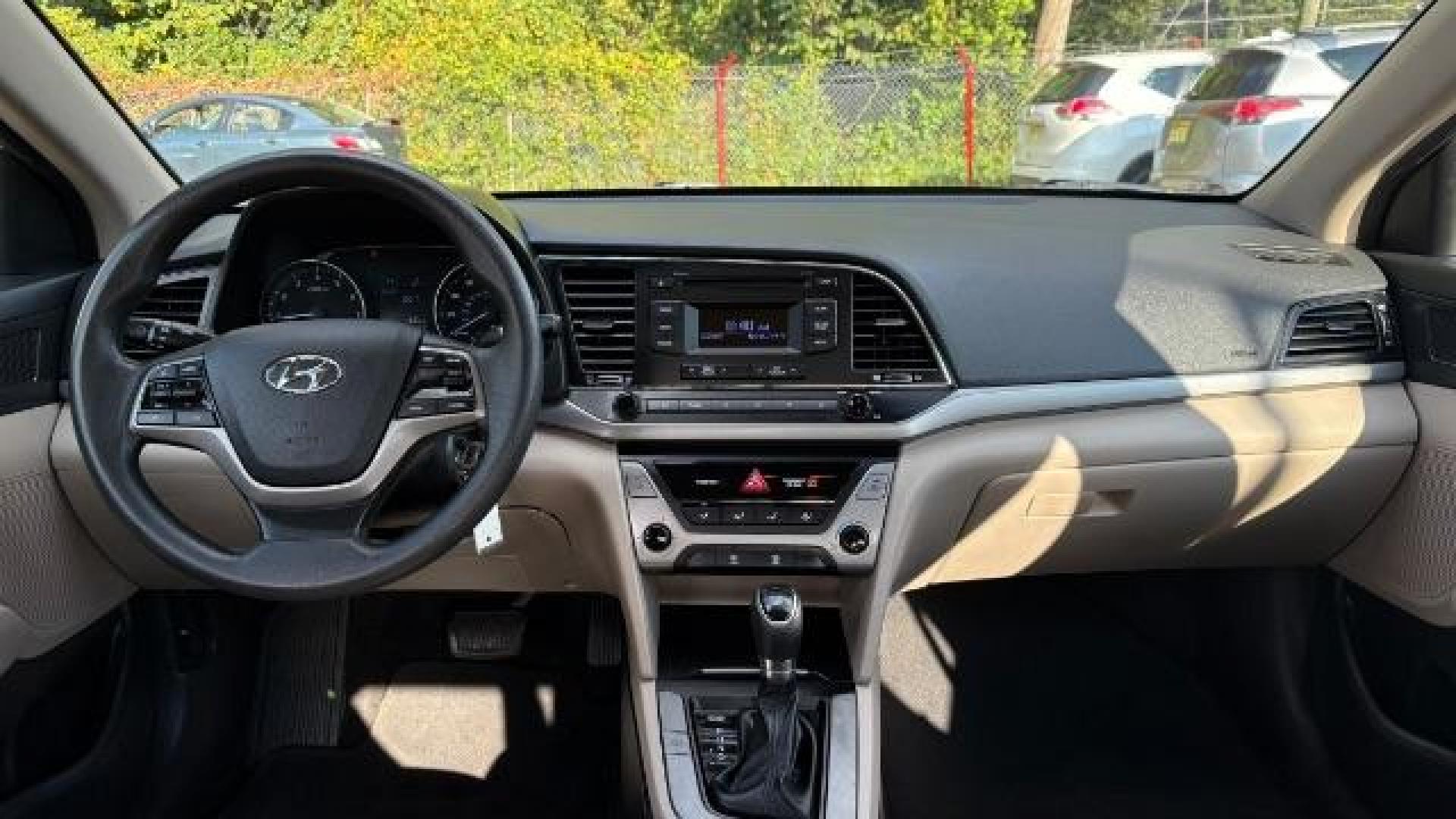 2017 White Hyundai Elantra SE 6AT (5NPD74LF3HH) with an 1.8L L4 DOHC 16V engine, 6-Speed Automatic transmission, located at 1806 Veterans Memorial Hwy SW, Austell, GA, 30168, (770) 944-9558, 33.817959, -84.606987 - Photo#7