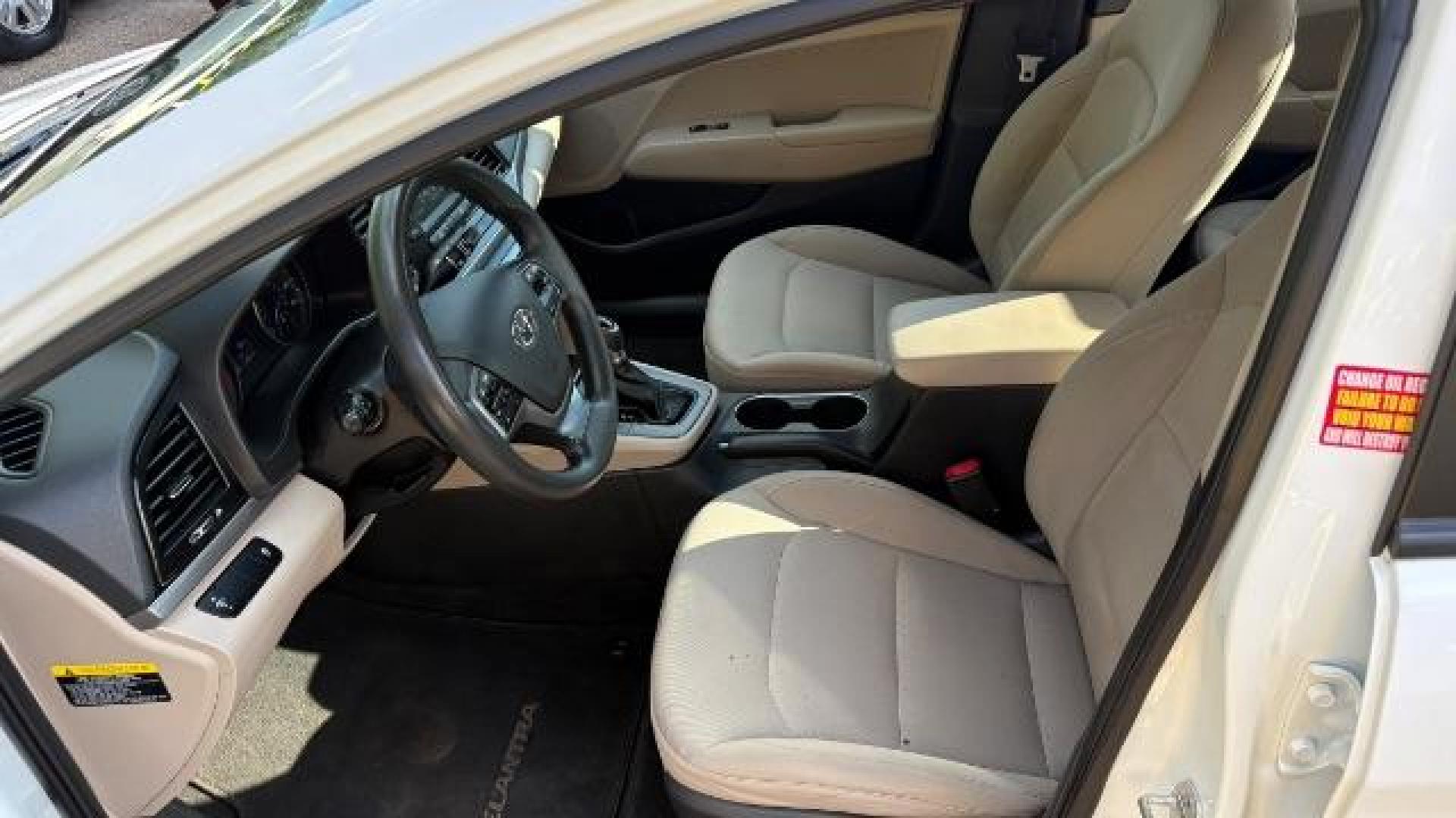 2017 White Hyundai Elantra SE 6AT (5NPD74LF3HH) with an 1.8L L4 DOHC 16V engine, 6-Speed Automatic transmission, located at 1806 Veterans Memorial Hwy SW, Austell, GA, 30168, (770) 944-9558, 33.817959, -84.606987 - Photo#8